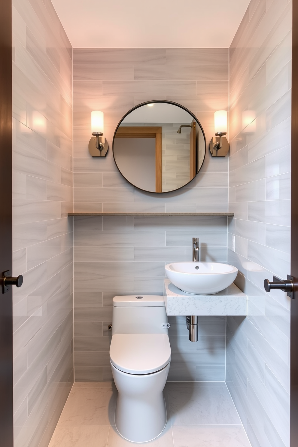 A compact toilet is positioned against the wall to maximize space in this 5x7 bathroom design. The walls are adorned with light gray tiles, creating a clean and modern aesthetic. A sleek floating vanity with a quartz countertop complements the compact toilet. Above the vanity, a round mirror with a minimalist frame reflects the soft ambient lighting from stylish sconces.