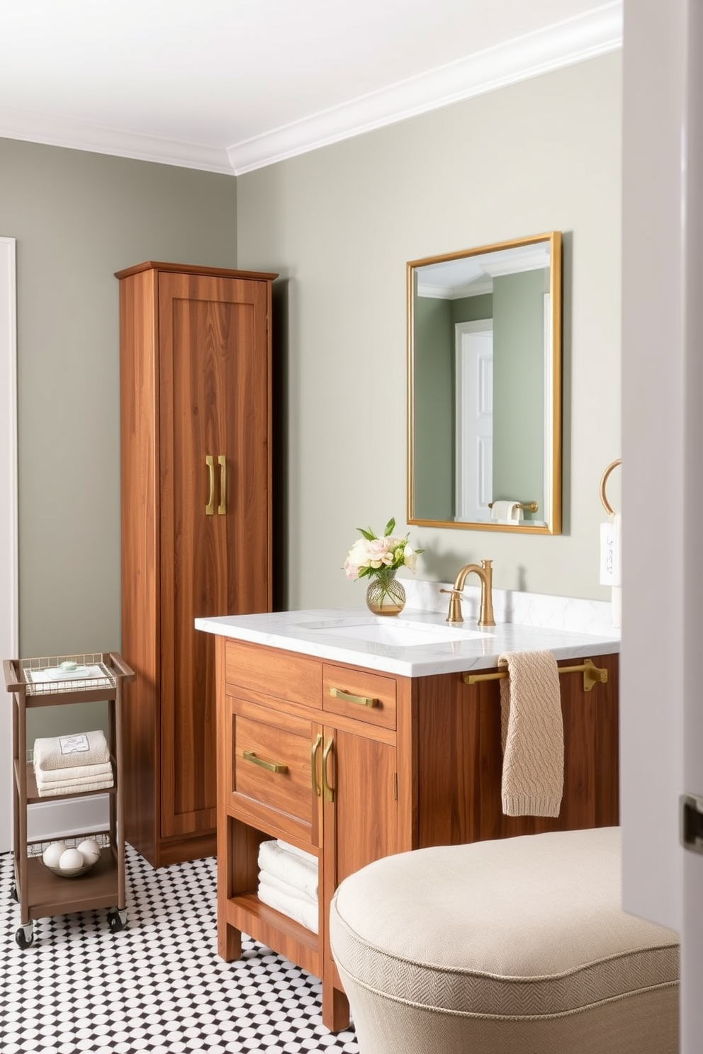 A stylish 5x7 bathroom design featuring a wooden vanity with a marble countertop and two sinks installed. Above the countertop, two rectangular mirrors with gold frames hang side by side, enhancing the elegance of the space. To the left of the vanity, a tall wooden cabinet provides ample storage. A small cart with additional storage options is placed nearby, adding functionality without compromising style. The walls are painted in a muted green shade, creating a serene atmosphere. The floor showcases a white and black patterned tile, adding visual interest to the design. A decorative vase with fresh flowers sits on the countertop, bringing a touch of nature indoors. A beige towel hangs from one of the sink faucets, completing the inviting look of this sophisticated bathroom.