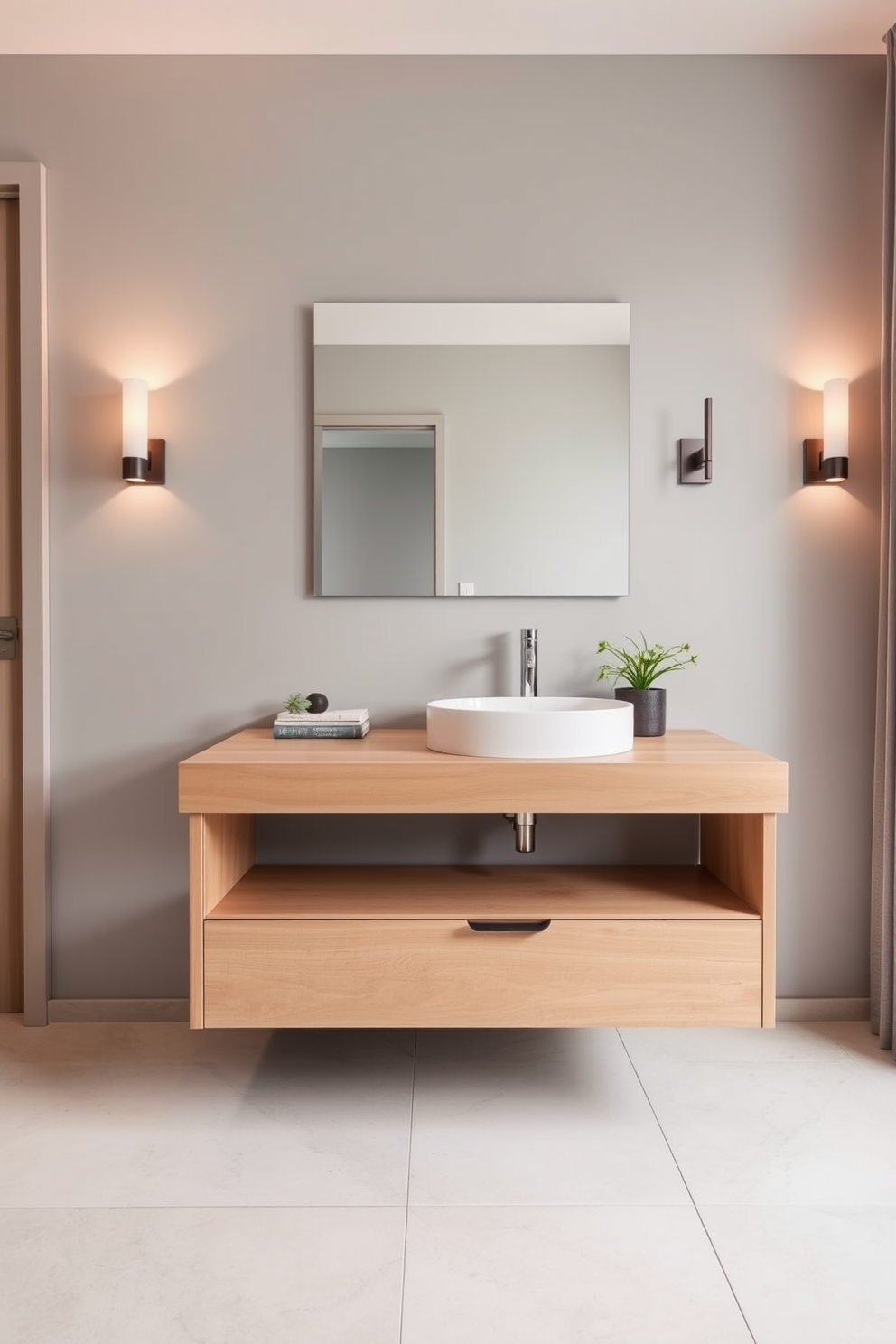 Open shelving units are strategically placed above the toilet and next to the sink, showcasing neatly arranged towels and decorative baskets. The walls are painted in a soft gray, while the shelves are made of reclaimed wood for a warm, rustic touch. The bathroom features a sleek, modern sink with a brushed nickel faucet that complements the overall aesthetic. A large round mirror hangs above the sink, reflecting the natural light from the window, enhancing the airy feel of the space.