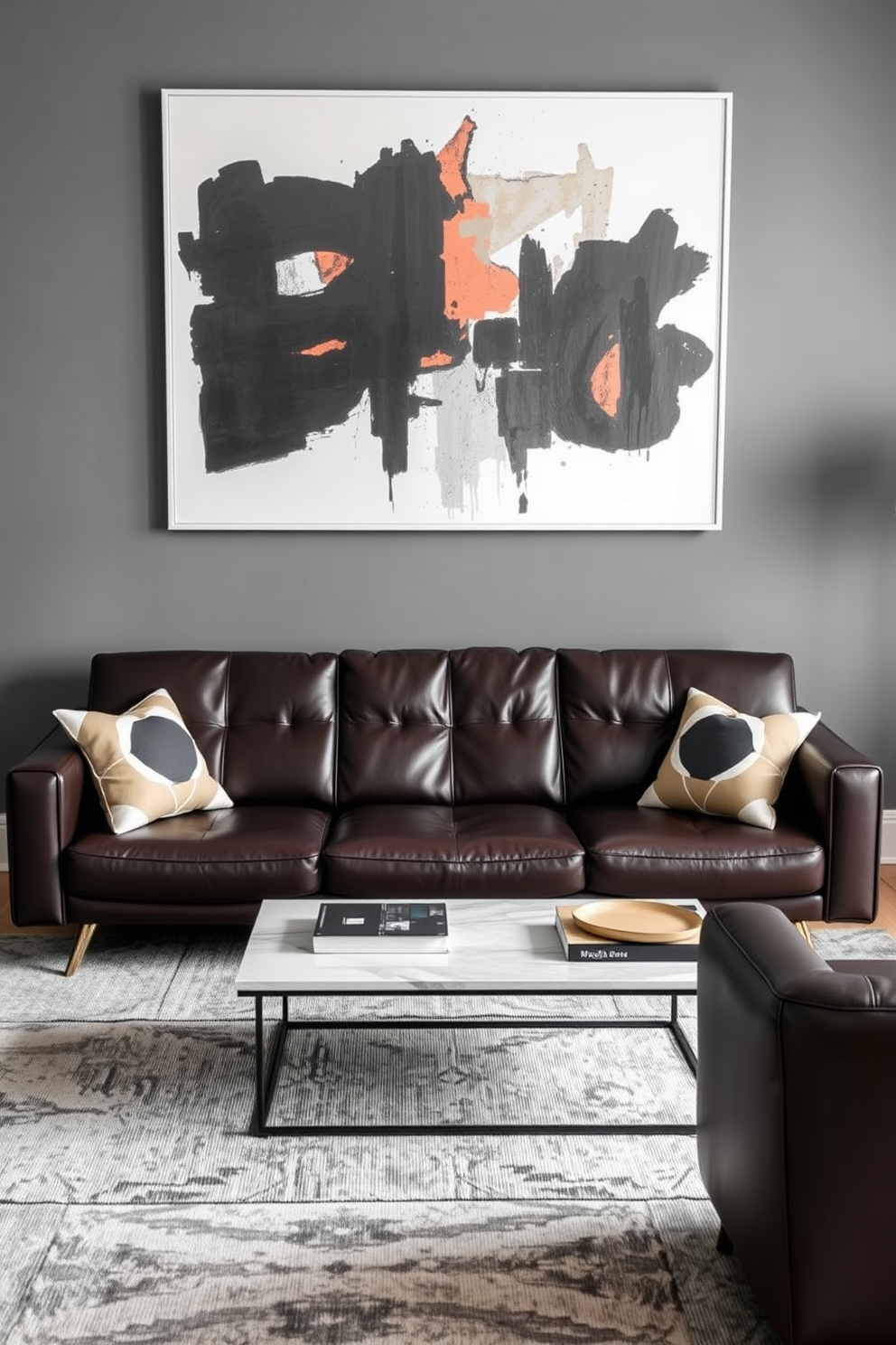 A sleek leather sofa in a contemporary living room exudes sophistication and style. The sofa is paired with a minimalist coffee table and accented by bold geometric cushions. The walls are painted in a cool gray tone, providing a striking contrast to the rich leather. A large abstract artwork hangs above the sofa, adding a dynamic focal point to the space.