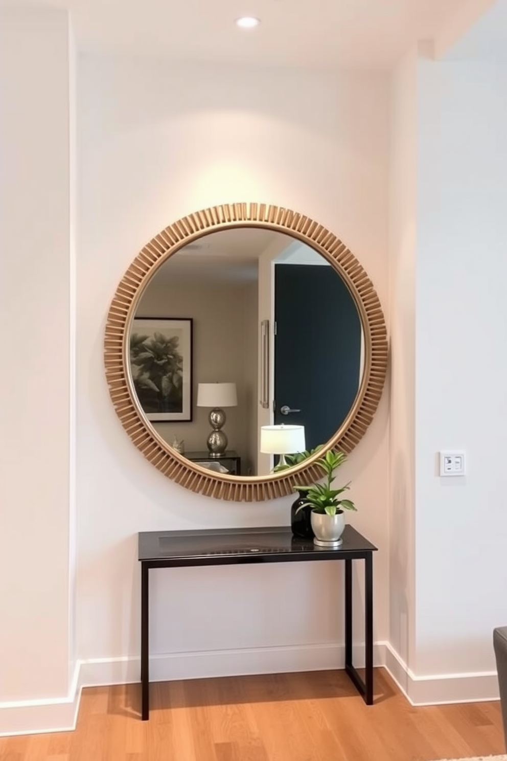 A decorative mirror is positioned strategically to enhance the perception of space in the apartment entryway. The entryway features a sleek console table beneath the mirror, with a stylish lamp and a small potted plant adding warmth and character.