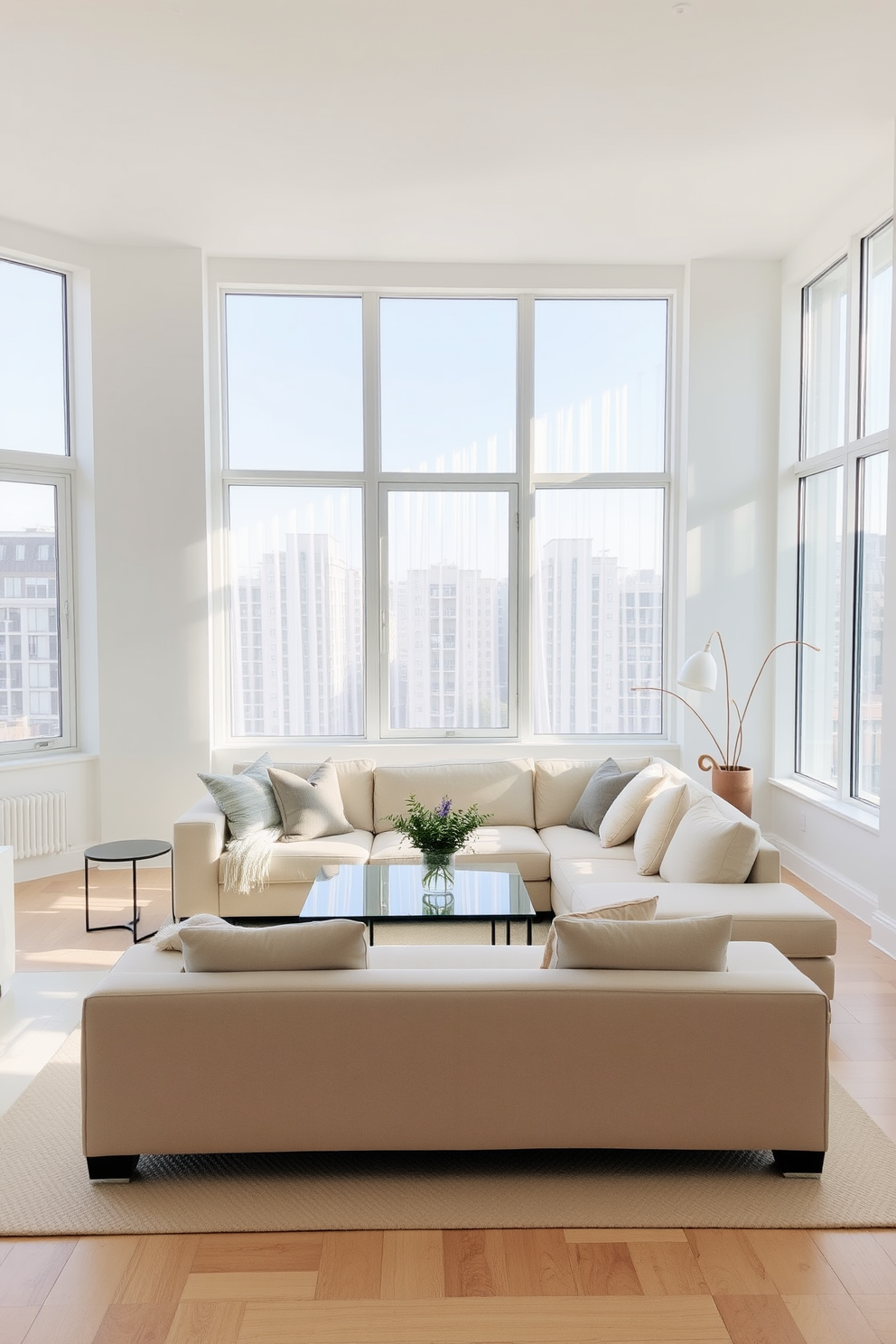 A bright and airy apartment living room filled with natural light. Soft white walls complement light wood flooring, creating a welcoming atmosphere. A plush cream sofa is centered in the room, adorned with pastel-colored throw pillows. A sleek glass coffee table sits in front, reflecting the sunlight streaming through large windows. In one corner, a cozy reading nook features a light gray armchair and a small bookshelf filled with colorful books. Potted plants add a touch of greenery, enhancing the fresh and open feel of the space.