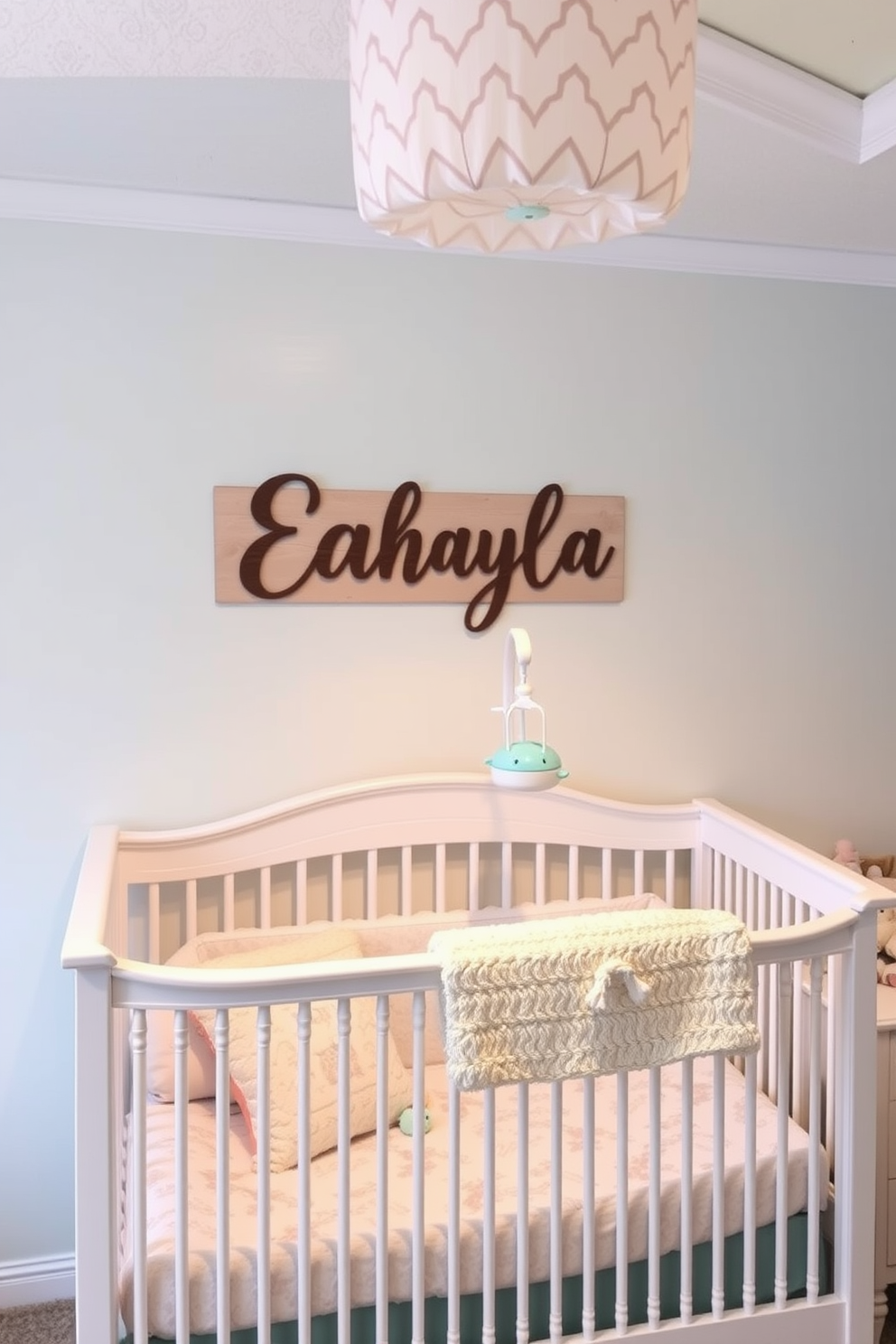 A cozy baby bedroom featuring personalized name decor above the crib. The walls are painted in soft pastel colors, and the crib is adorned with plush bedding and a mobile.