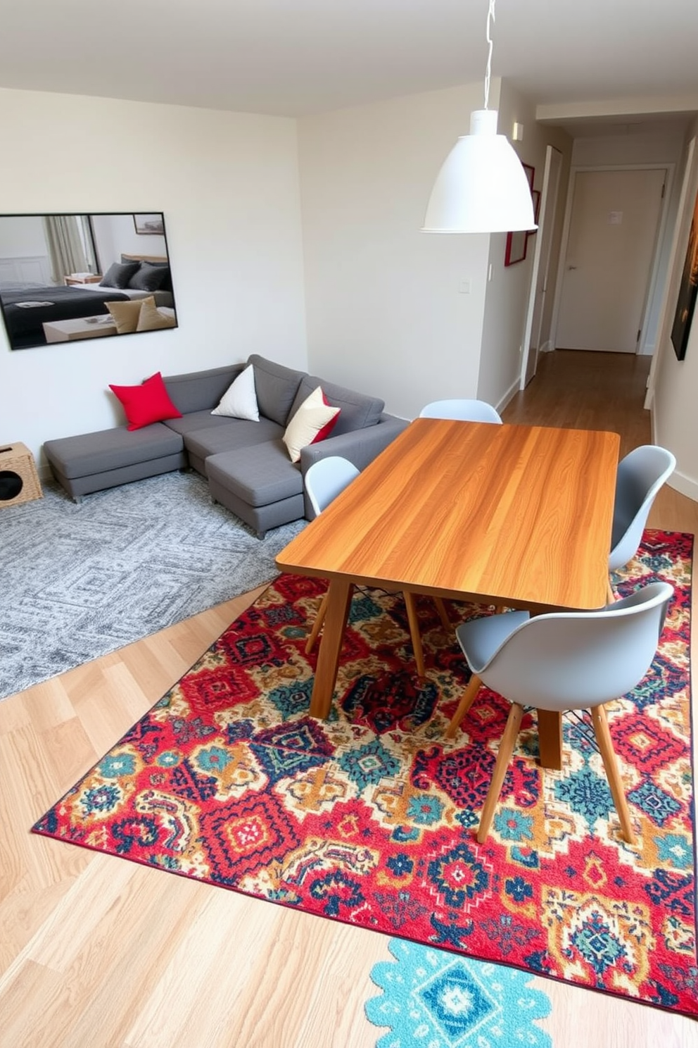 Create a stylish bachelor apartment featuring distinct zones defined by area rugs. The living area showcases a plush gray rug that complements a modern sectional sofa, while a vibrant patterned rug demarcates the dining space with a sleek wooden table and contemporary chairs.