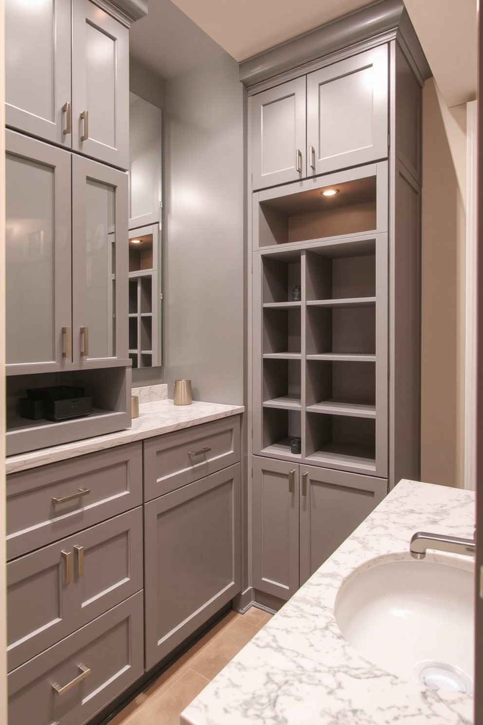 A stylish basement bathroom featuring sleek modern faucets that enhance the overall aesthetic. The walls are adorned with elegant tiles in soft gray tones, complemented by a contemporary freestanding bathtub. The space is illuminated by warm ambient lighting that creates a cozy atmosphere. A chic vanity with a minimalist design sits beside the bathtub, showcasing a beautiful marble countertop.