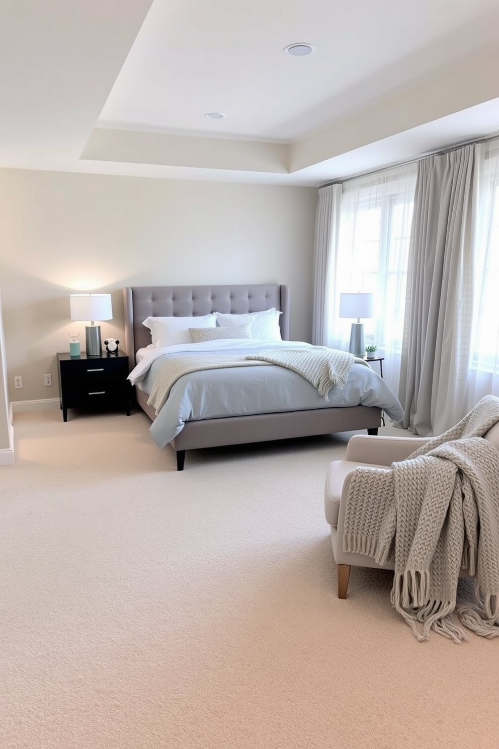 Create a serene atmosphere with neutrals in a basement bedroom. The walls are painted in soft beige, complemented by a plush cream-colored carpet that adds warmth to the space. A king-sized bed with a tufted headboard takes center stage, adorned with light gray and white bedding. Flanking the bed are sleek nightstands with minimalist lamps that emit a soft glow, enhancing the tranquil vibe. In one corner, a cozy reading nook features a comfortable armchair draped with a chunky knit blanket and a small side table. Large windows allow natural light to filter in, while sheer curtains maintain privacy without sacrificing brightness.