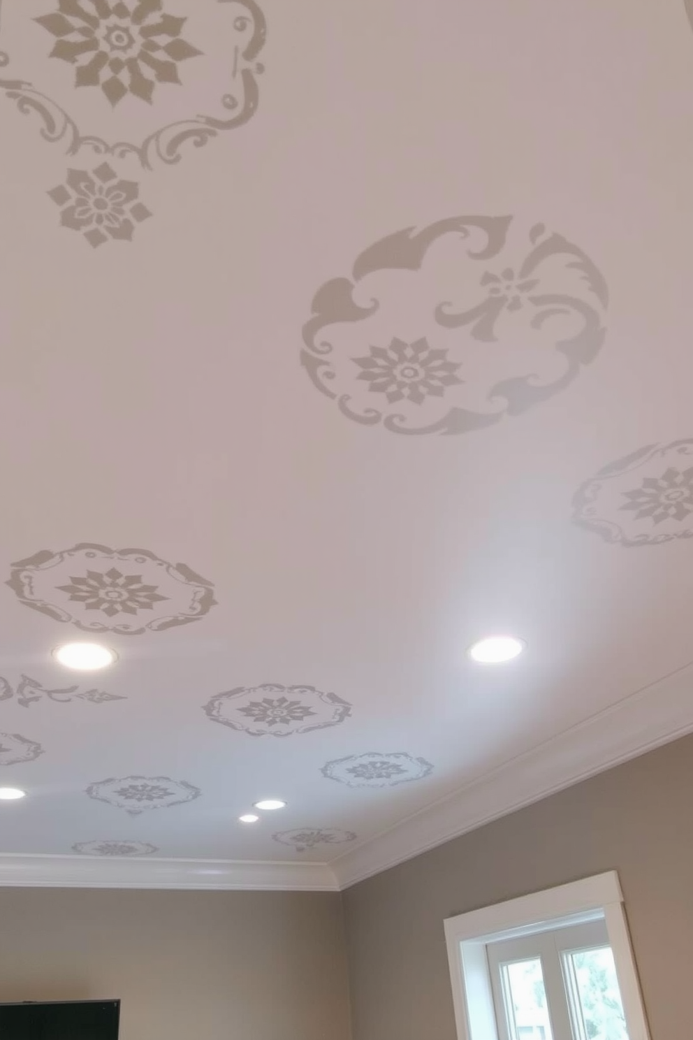 A stylish basement ceiling featuring stenciled patterns that create visual interest. The patterns are in a subtle contrast to the ceiling color, enhancing the overall ambiance of the space.