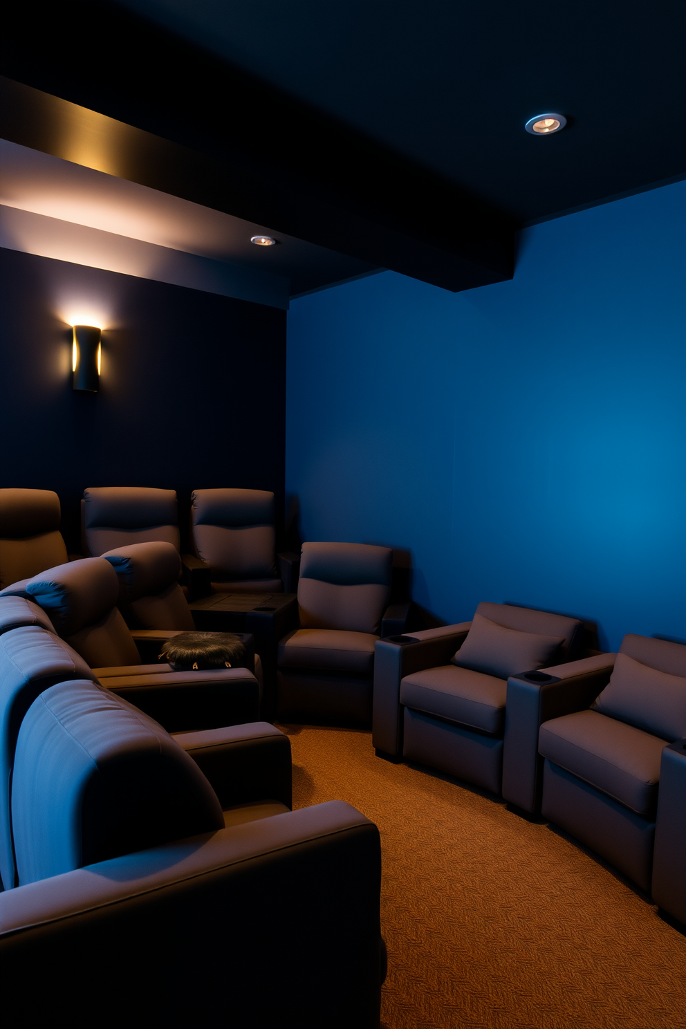 A cozy home theater featuring plush seating arranged in a semi-circle. The walls are painted a deep navy blue, and soft ambient lighting creates a warm atmosphere.