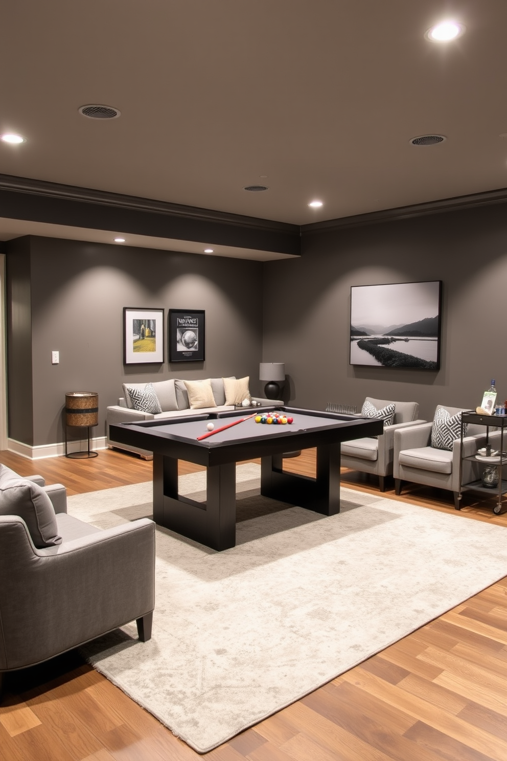 A cozy basement family room featuring mood lighting with dimmable fixtures that create a warm and inviting atmosphere. The space includes a plush sectional sofa in a soft gray fabric, accented by colorful throw pillows and a large area rug that adds texture and comfort.