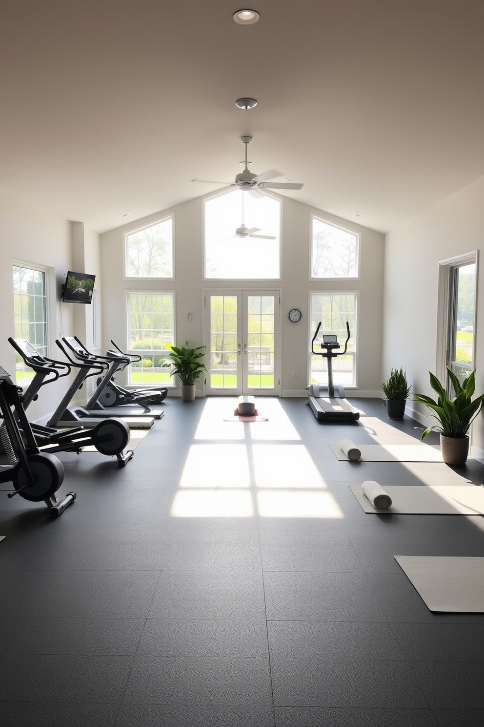 A basement gym featuring rubber flooring that provides both comfort and safety during workouts. The space is equipped with a variety of exercise machines, free weights, and a large wall mirror to enhance the workout experience.