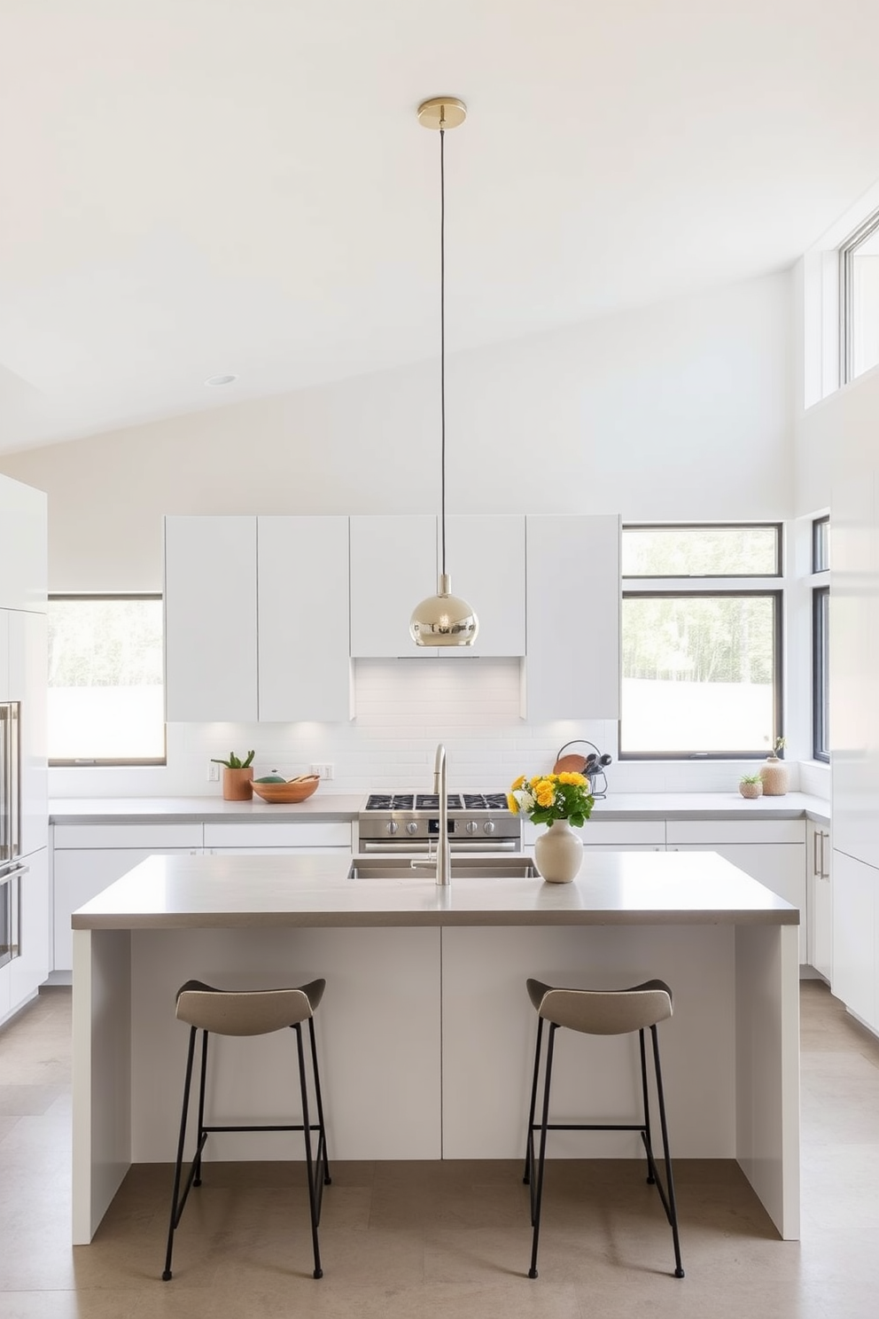 A minimalist basement kitchen featuring sleek cabinetry in a soft white finish. The countertops are made of polished concrete, and there is a central island with bar stools that maintain the clean aesthetic. Large windows allow natural light to flood the space, highlighting the open layout. Simple pendant lights hang above the island, providing a warm glow against the neutral color palette.