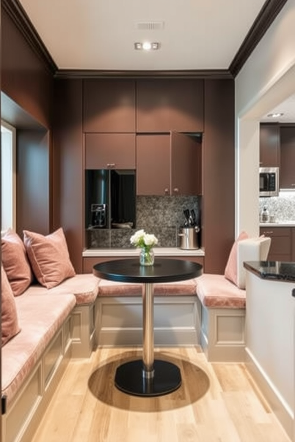 Cozy nook with built-in seating. The area features plush cushions in soft fabrics and a small round table for intimate dining. Basement kitchen design ideas. The kitchen includes sleek cabinetry, modern appliances, and ample lighting to create an inviting atmosphere.