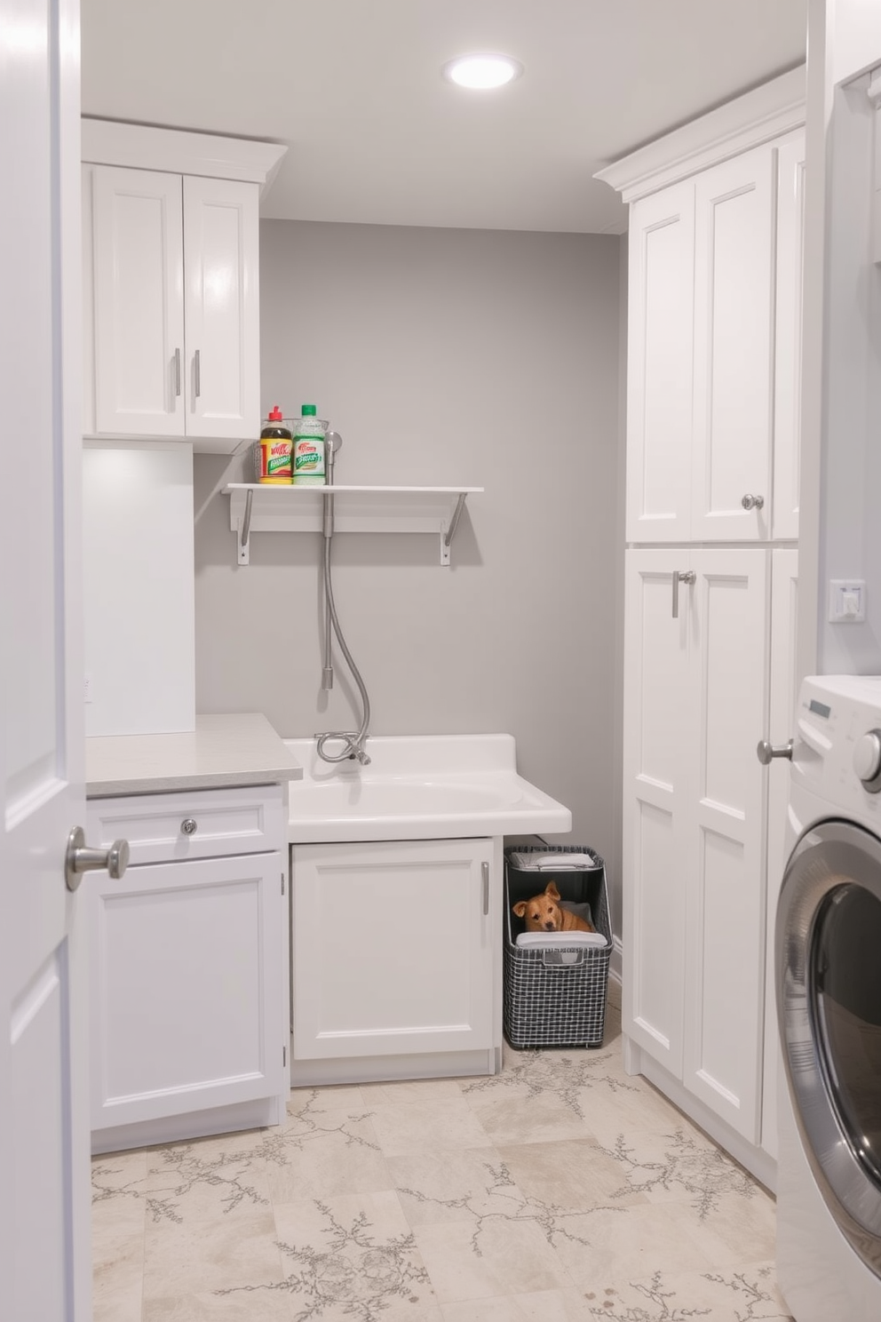 A functional basement laundry room featuring a pegboard on the wall for hanging tools and organizing supplies. The space includes a large utility sink with a modern faucet and ample countertop space for folding laundry. The walls are painted in a light gray color to enhance brightness, while the floor is covered with durable vinyl tiles. Shelving above the washer and dryer provides additional storage for detergents and cleaning supplies.