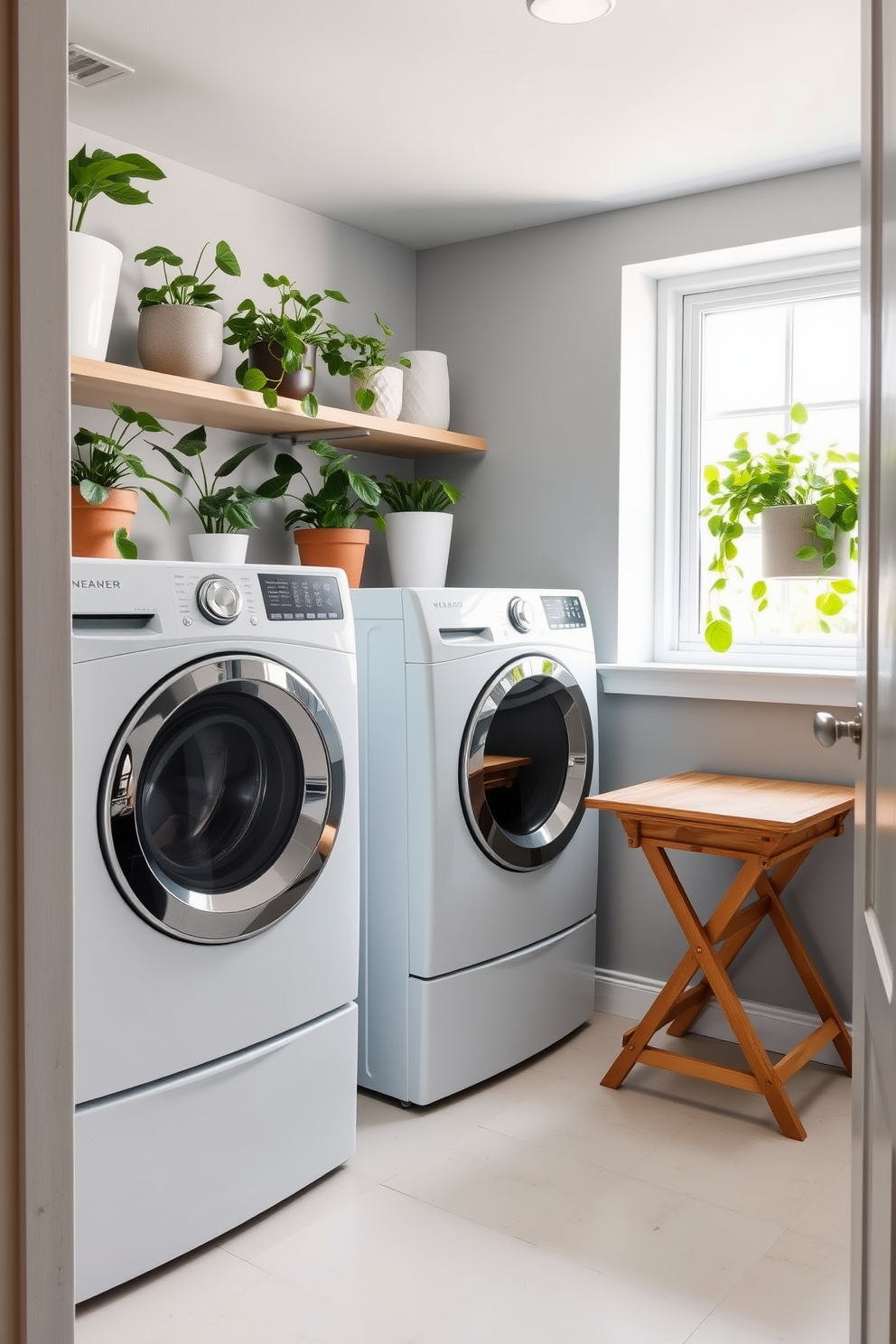 A cozy basement laundry room featuring a sleek white washer and dryer set against a backdrop of soft gray walls. Lush green plants are strategically placed on shelves and countertops, adding a refreshing touch to the space. The flooring is a durable light-colored tile that complements the overall design. A wooden folding table is positioned near a window, providing a functional area for sorting and folding laundry while enjoying natural light.