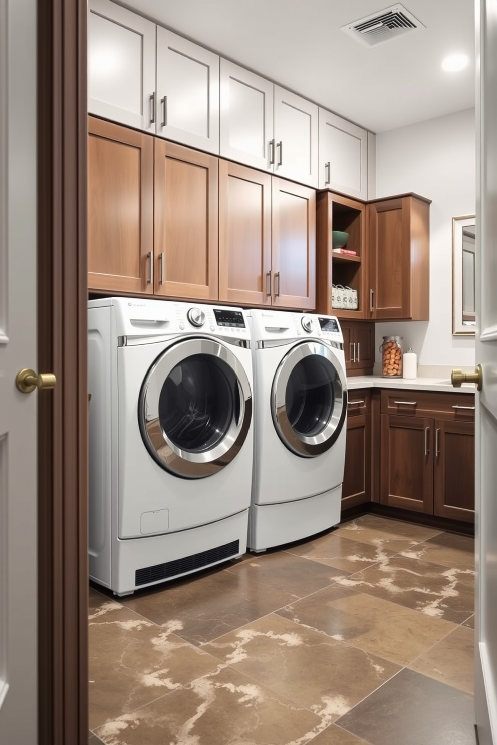 A functional basement laundry room features durable flooring that is both stylish and easy to maintain. The space is equipped with a modern washer and dryer set, complemented by ample cabinetry for storage and organization.