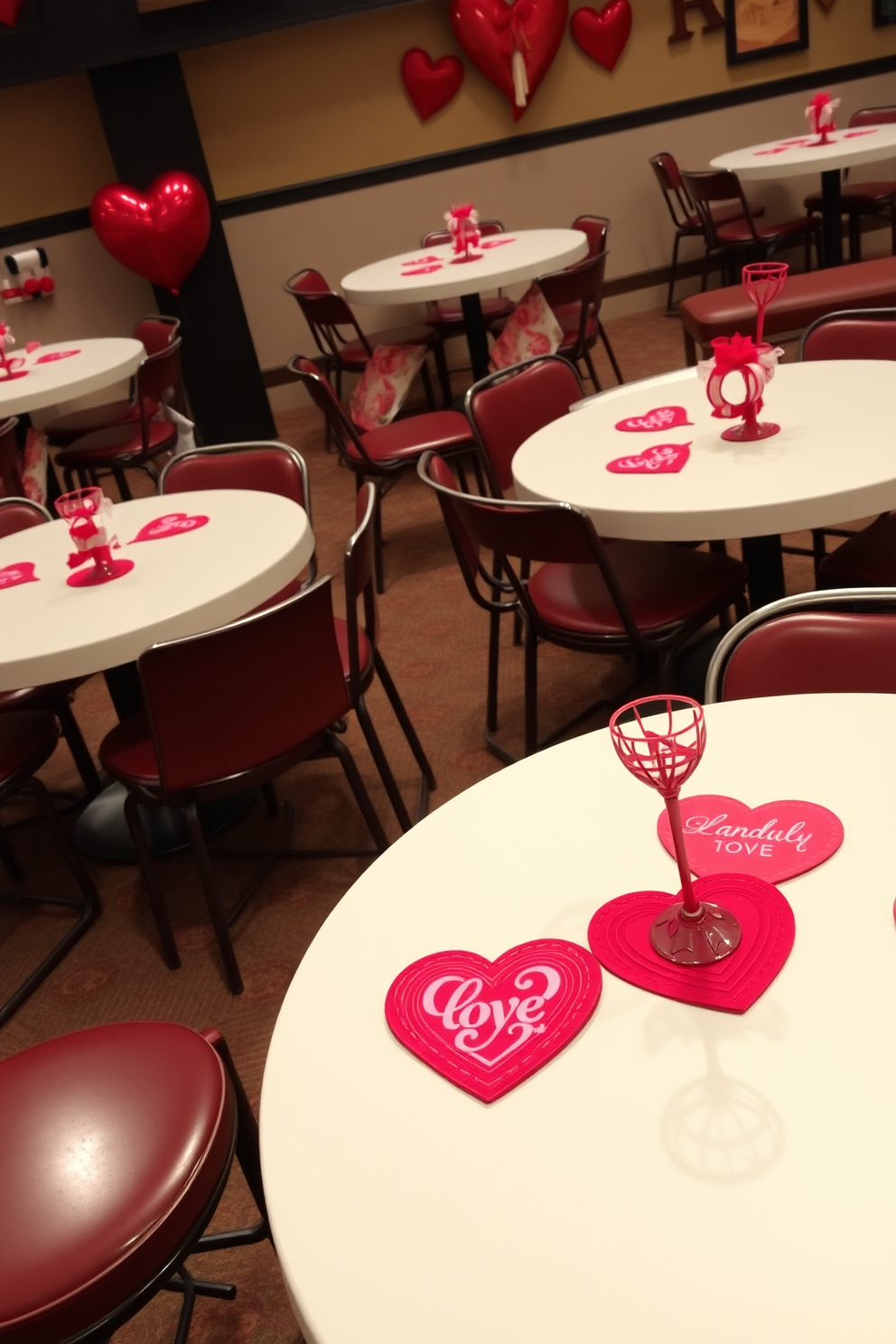 Creative heart-shaped coasters are placed on various tables throughout the basement. The coasters are made of vibrant red felt and feature intricate designs that add a festive touch to the Valentine's Day decor.