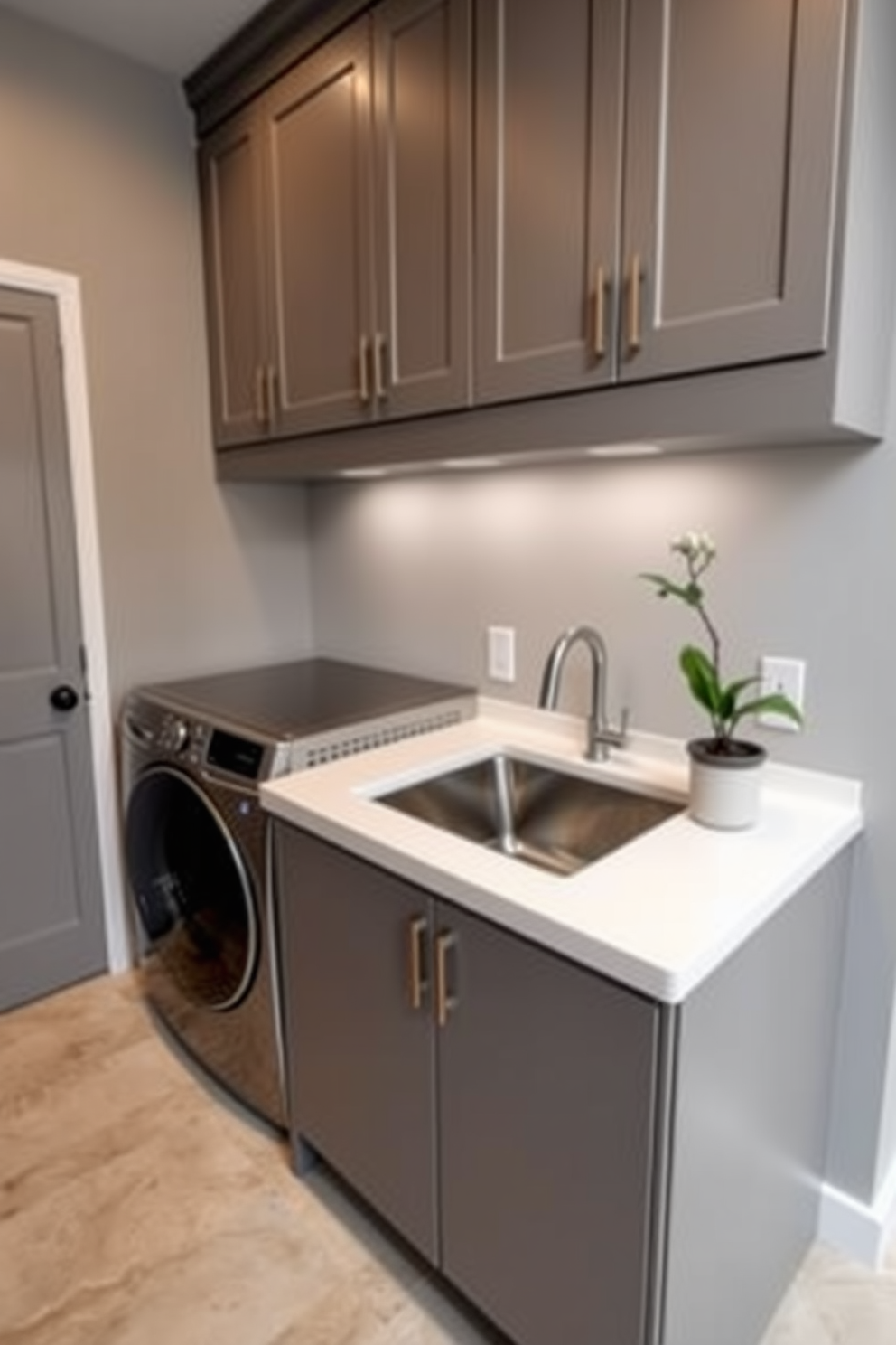 A serene bathroom laundry room combo with soft neutral colors creating a calming atmosphere. The walls are painted in a light beige shade, complemented by a sleek white washer and dryer tucked into a stylish cabinetry. A spacious countertop in a warm taupe provides ample space for folding laundry and placing decorative items. A small potted plant adds a touch of greenery, while a woven basket for storage sits neatly beside the appliances.