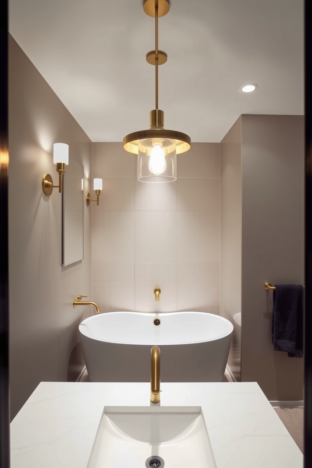 A contemporary bathroom featuring elegant brass fixtures that add a modern touch. The lighting is soft and ambient, with stylish sconces flanking the mirror and a statement pendant light hanging above the bathtub. The walls are adorned with textured tiles in neutral tones, creating a warm and inviting atmosphere. A sleek vanity with a polished countertop complements the overall design, while strategically placed recessed lighting enhances the space's functionality.