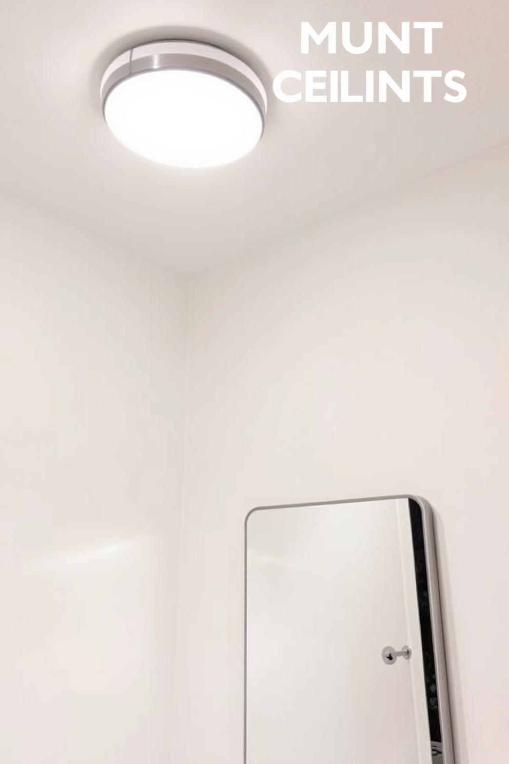 A cozy bathroom with flush mount ceiling lights designed for low ceilings. The lights are sleek and modern, providing ample illumination without taking up visual space. The walls are painted in a soft white, enhancing the brightness of the room. A stylish mirror with a minimalist frame reflects the light, creating an airy atmosphere.