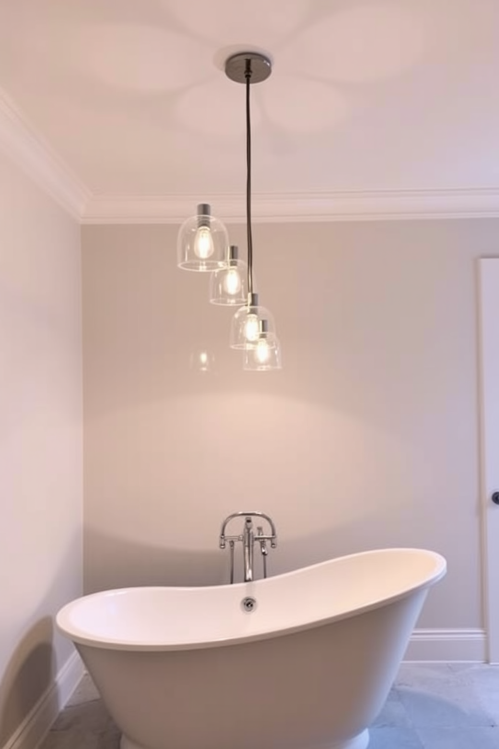 A serene bathroom ambiance features elegant pendant lights gracefully hanging over a luxurious freestanding bathtub. The soft glow of the lights creates a warm atmosphere, enhancing the overall aesthetic of the space.