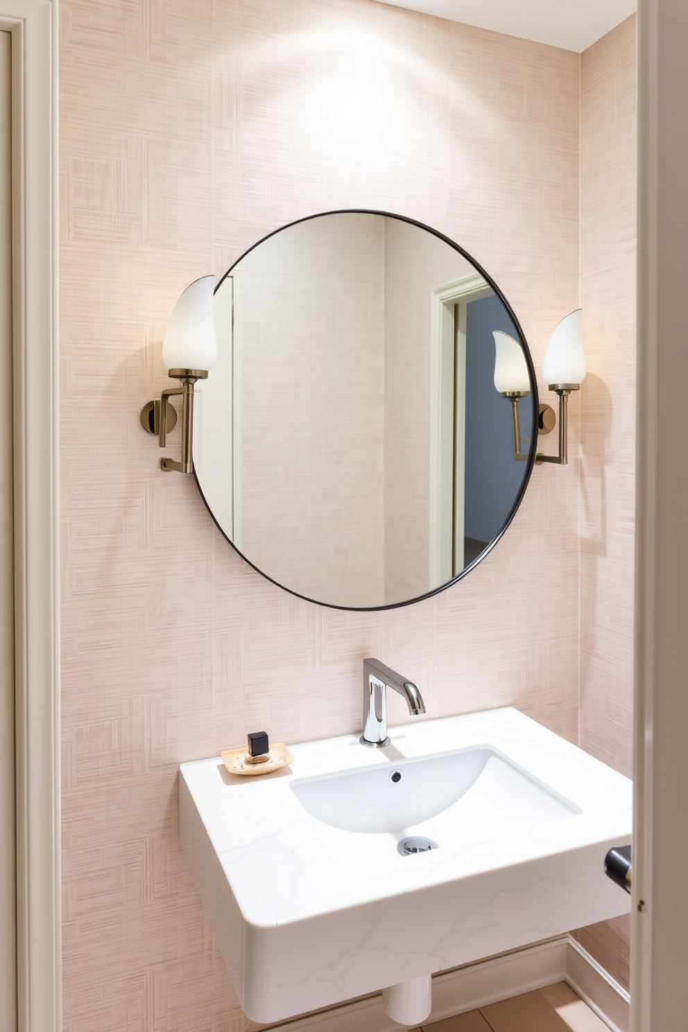 A chic powder room featuring wall-mounted faucets that add a modern flair. The space includes a sleek floating vanity with a glossy finish and a large round mirror that enhances the contemporary aesthetic. The walls are adorned with textured wallpaper in soft neutral tones, creating a warm and inviting atmosphere. Elegant lighting fixtures flank the mirror, casting a soft glow that complements the overall design.