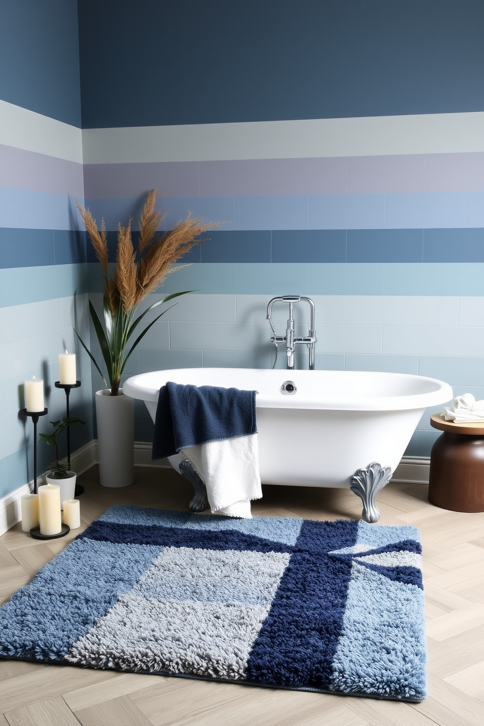 Layered colors create a vibrant and inviting atmosphere in the bathroom. A plush bathroom rug features a mix of deep blues and soft grays, adding depth and texture to the space. The rug is placed beneath a freestanding bathtub, enhancing the overall design. Surrounding it are complementary decor elements, such as candles and potted plants, that tie the color scheme together.