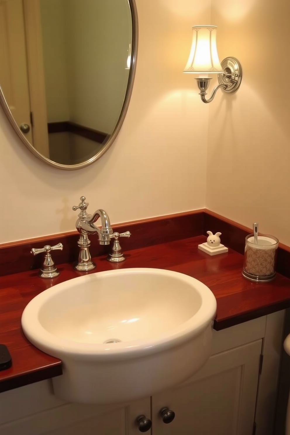 A traditional sink with a classic porcelain finish is the centerpiece of this elegant bathroom. Surrounding the sink are vintage-style fixtures in polished chrome, complementing the timeless design. The countertop is adorned with a rich mahogany wood, providing warmth and contrast to the white sink. Soft lighting from a nearby sconce enhances the inviting atmosphere, making the space feel cozy and sophisticated.