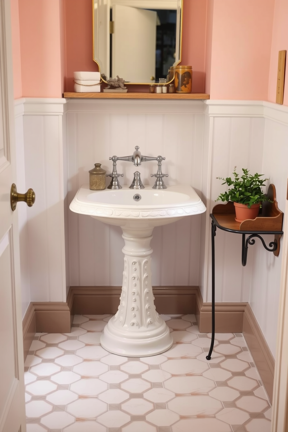 A charming bathroom featuring a pedestal sink with intricate detailing and a classic design. The sink is complemented by a vintage-style faucet and surrounded by soft pastel-colored walls. To the side, a small wooden shelf displays decorative items and a potted plant. The floor is adorned with elegant hexagonal tiles that enhance the overall vintage aesthetic.