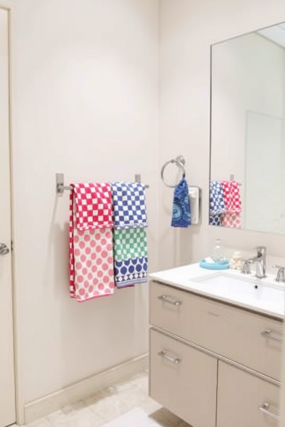 Create a vibrant bathroom setting featuring patterned towels that add a playful accent to the space. The towels are arranged neatly on a stylish towel rack, showcasing a variety of colors and designs that complement the overall decor. Incorporate a modern vanity with a sleek finish and a large mirror above it. The walls are painted in a soft neutral tone, allowing the patterned towels to stand out as a focal point in the room.