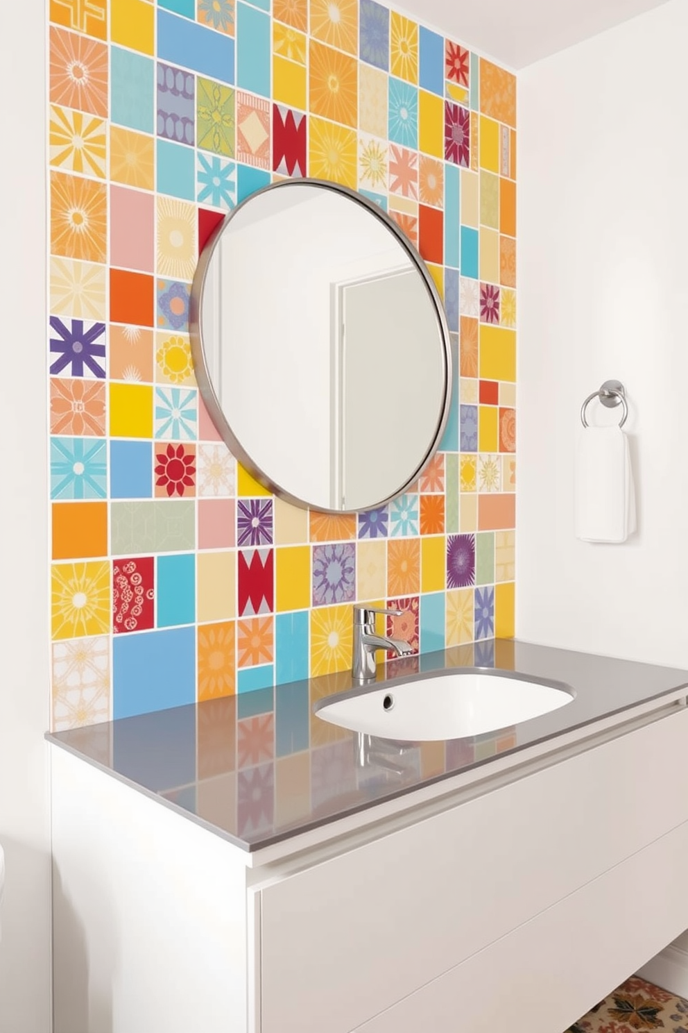 A vibrant bathroom setting featuring a backsplash made of brightly colored tiles in various geometric patterns. The vanity is sleek and modern with a glossy finish, complemented by a large round mirror above it.