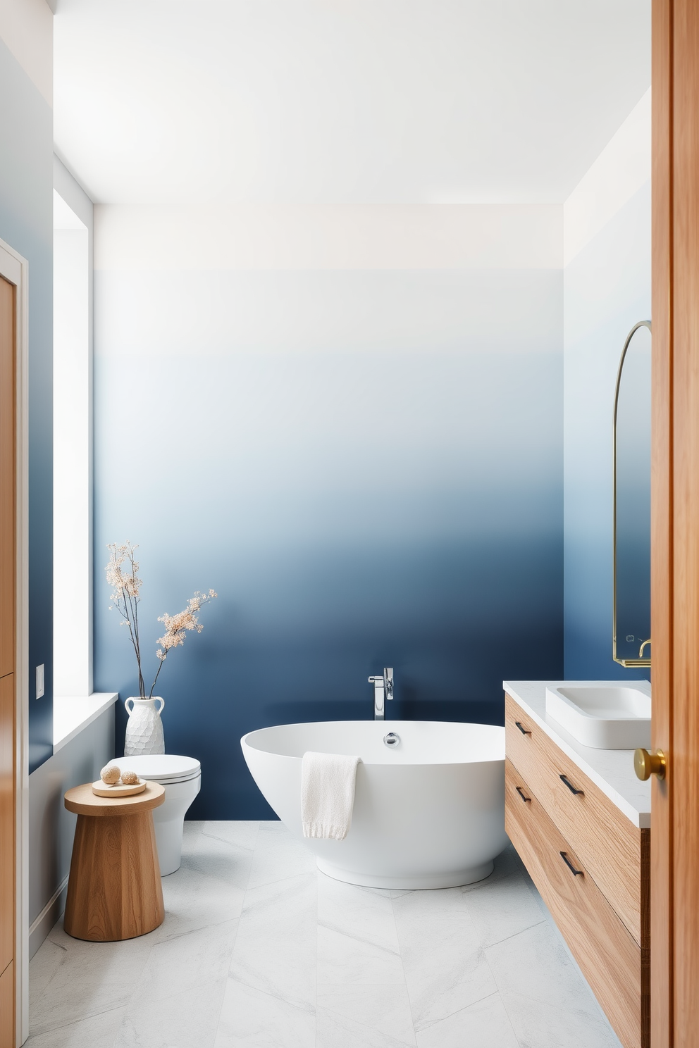 Create a serene bathroom atmosphere with soft ombre wallpaper that transitions from light blue at the top to a deeper navy at the bottom. The design should evoke a sense of calm and tranquility, perfect for a relaxing retreat. Incorporate elegant fixtures such as a freestanding tub and a sleek modern vanity to complement the wallpaper. Use natural materials like wood and stone to enhance the overall aesthetic and create a harmonious balance in the space.