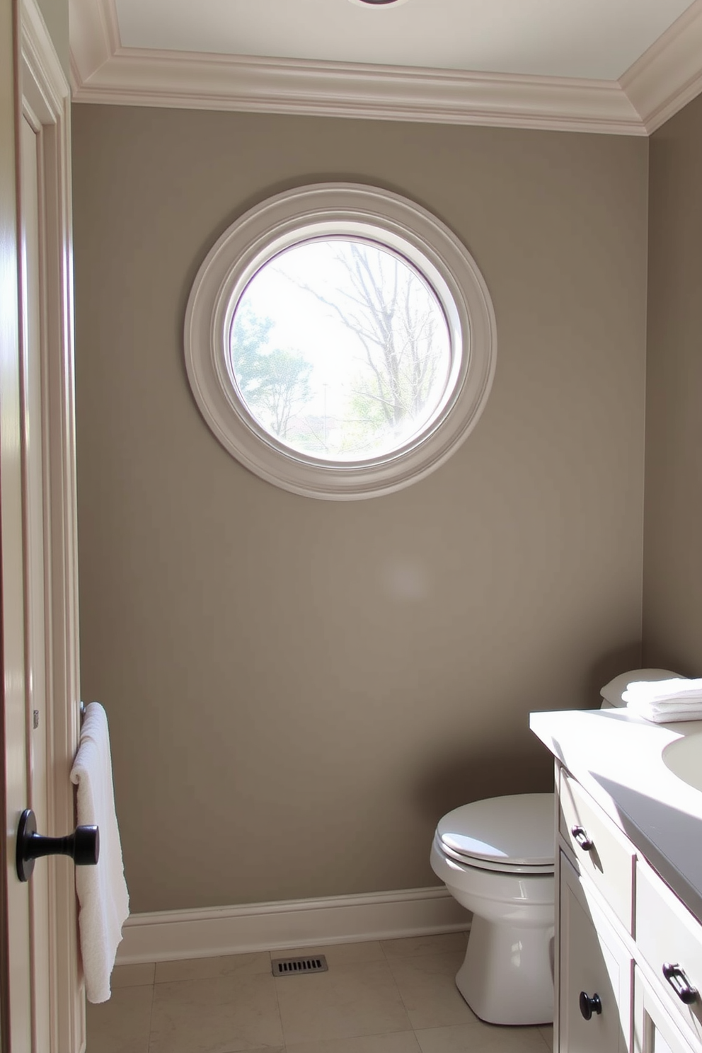 A bright and airy bathroom featuring corner windows that allow natural light to flood the space. The windows are framed with elegant white trim and adorned with sheer curtains that gently sway in the breeze. The centerpiece of the room is a freestanding soaking tub positioned beneath the corner windows. Surrounding the tub is a mix of textured tiles and warm wood accents that create a harmonious and inviting atmosphere.