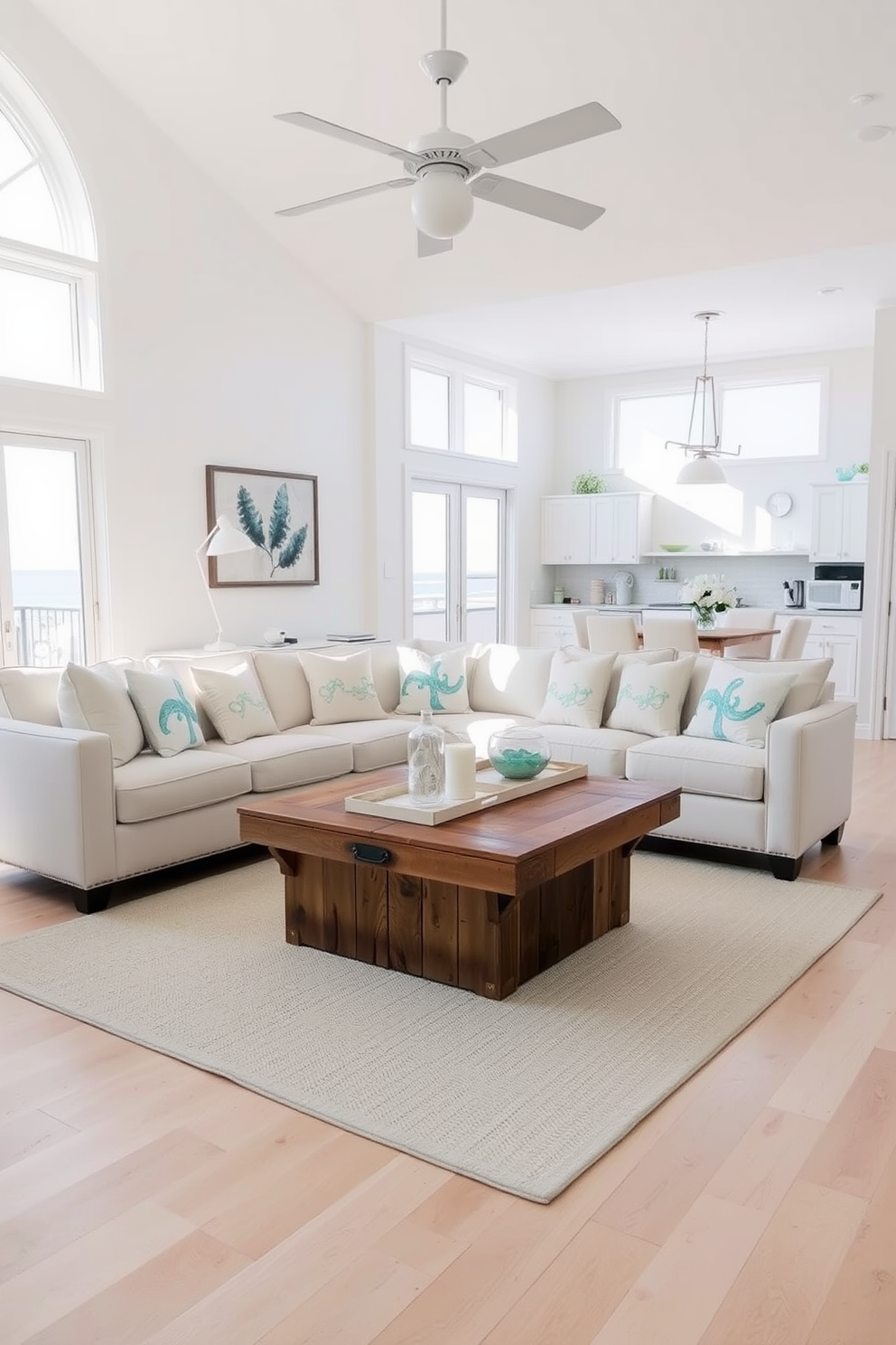 A bright and airy beach apartment featuring light-colored hardwood floors that enhance the sense of space and warmth. The open-plan living area includes large windows that allow natural light to flood in, creating a welcoming atmosphere. The decor incorporates soft pastel colors and natural textures, with a comfortable sofa adorned with ocean-themed cushions. A stylish coffee table made of reclaimed wood sits in the center, surrounded by decorative elements that reflect a coastal lifestyle.