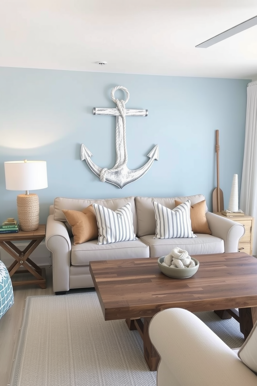 A cozy beach apartment with nautical decor featuring ropes and anchors. The living area is adorned with soft blue and white hues, complemented by a large anchor art piece on the wall. The furniture includes a comfortable beige sofa with striped throw pillows and a reclaimed wood coffee table. Nautical-themed accents such as a rope-wrapped lamp and decorative oars complete the seaside ambiance.