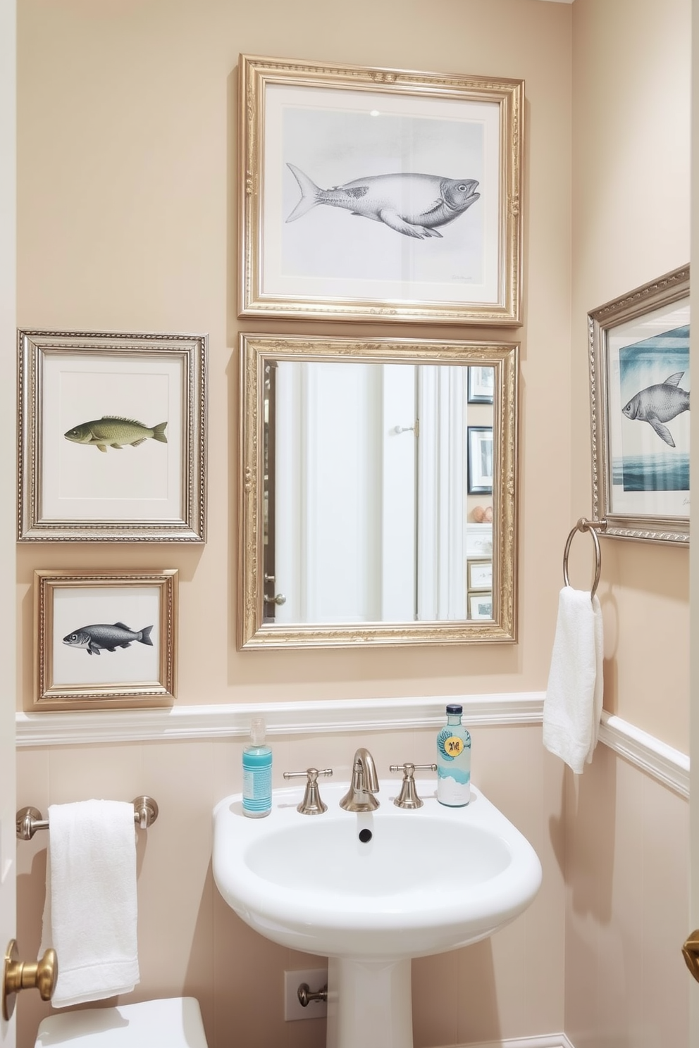 A beach-themed bathroom adorned with marine life prints in elegant frames. The walls are painted a soft sandy beige, complementing the light blue accents throughout the space.