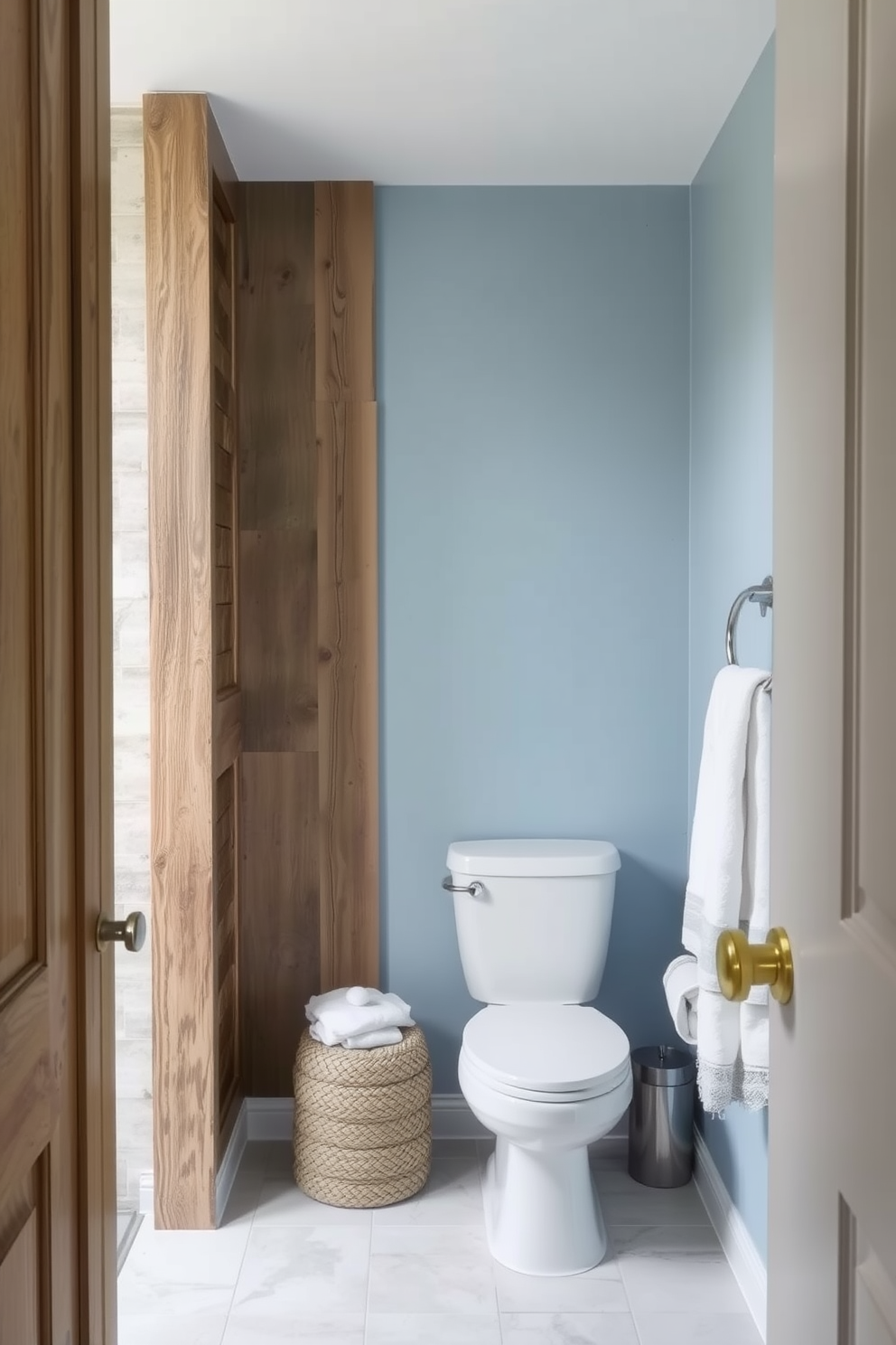 Accent wall with reclaimed wood. The beach-inspired bathroom features soft blue hues and natural textures.