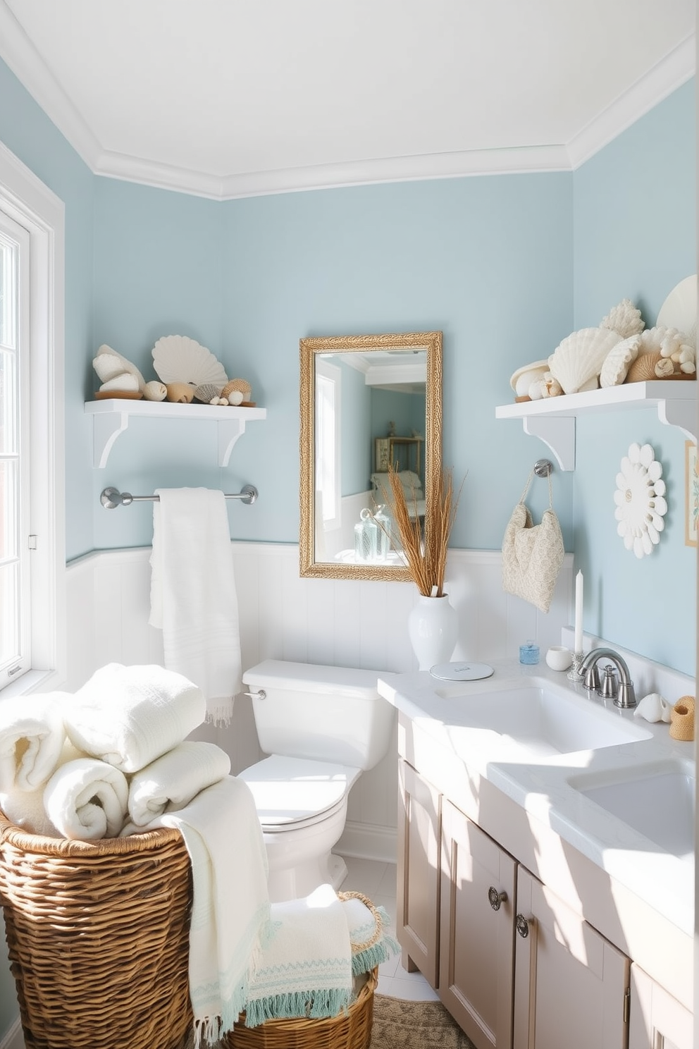 A serene beach bathroom setting adorned with seashell decor. The walls are painted in a soft blue hue, while seashells are artfully arranged on shelves and the vanity. Natural light floods the space through a large window, enhancing the coastal ambiance. A woven basket filled with beach towels adds a touch of warmth and texture to the design.