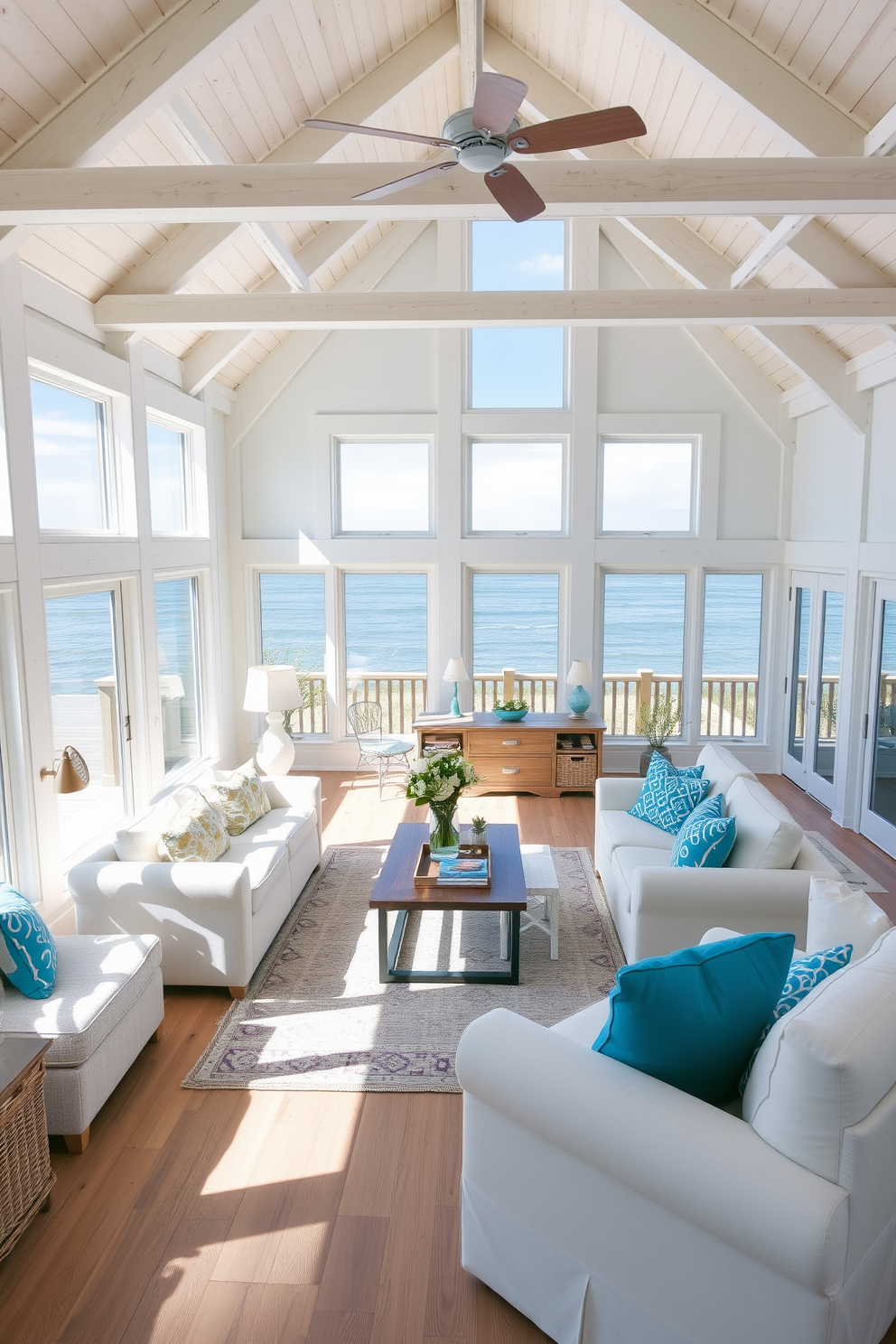 A bright and airy beach living room featuring whitewashed wooden beams that enhance the coastal charm. The space is adorned with soft, neutral-colored furniture and vibrant blue accents, creating a relaxing atmosphere. Large windows allow natural light to flood the room, offering stunning views of the ocean. A cozy seating area with plush cushions invites relaxation, while a large area rug adds warmth to the hardwood floor.