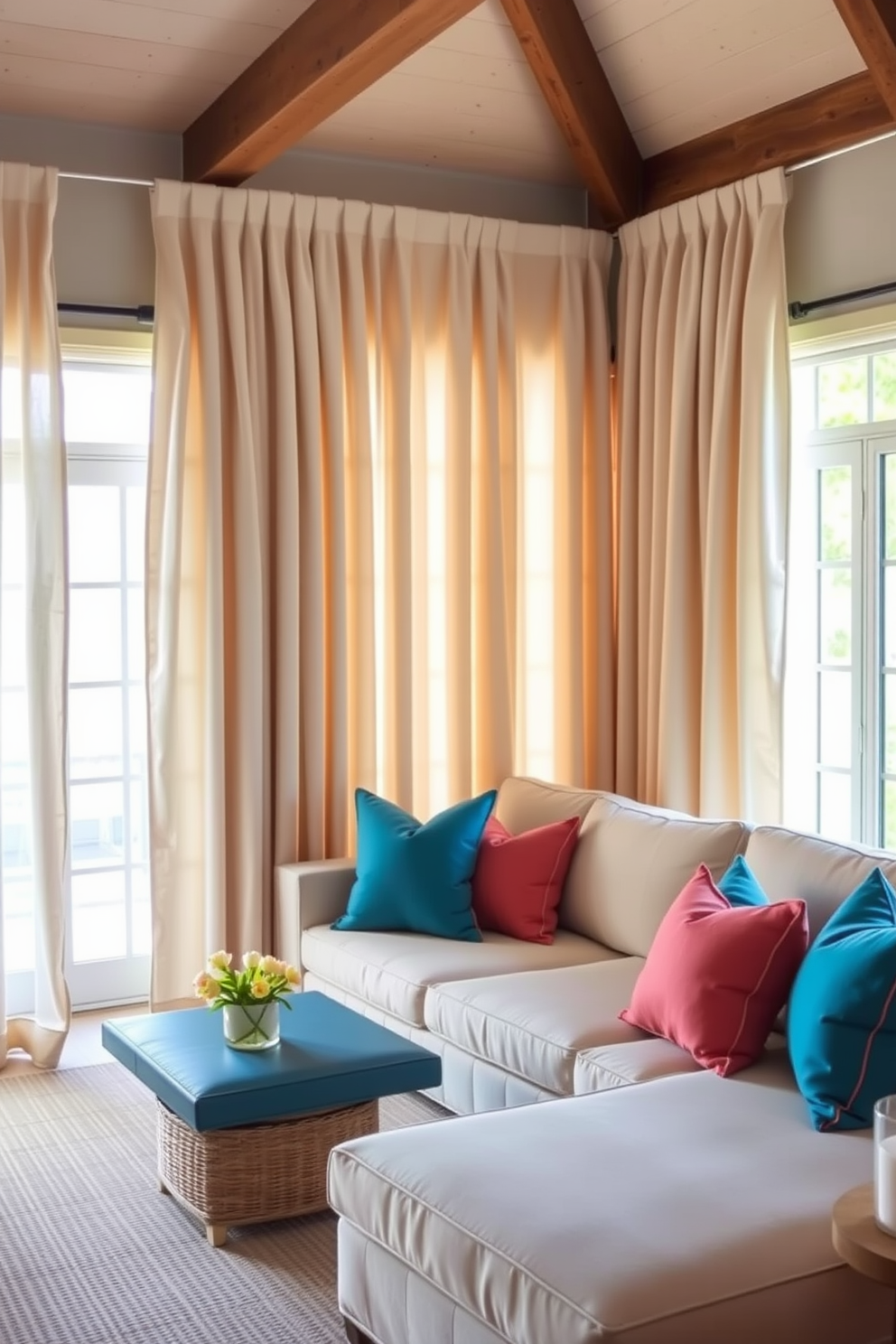 Soft linen curtains gently cascade from the ceiling, allowing natural light to filter into the space and create a warm, inviting atmosphere. The beach living room features a comfortable sectional sofa in light beige, accented with vibrant blue and coral throw pillows that evoke the colors of the ocean.