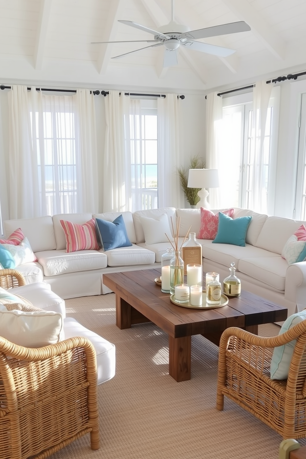 A bright and airy beach living room filled with natural light. The space features a large sectional sofa in light linen, accented with vibrant throw pillows in ocean hues. A rustic coffee table made from reclaimed wood sits in the center, surrounded by woven rattan chairs. Soft, sheer curtains flutter gently in the breeze, while a collection of candles and diffusers in coastal scents adorns the table.