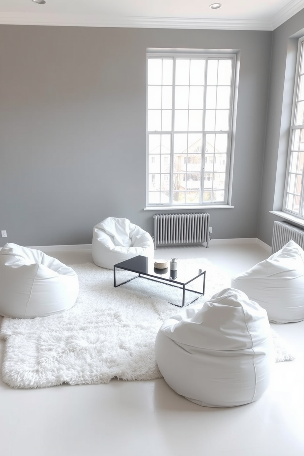 A modern living room featuring several bean bags in a monochromatic color scheme. The walls are painted in a soft gray, and the floor is adorned with a plush white rug that complements the bean bags. In one corner, a sleek coffee table sits atop the rug, providing a casual gathering space. Large windows allow natural light to flood the room, enhancing the serene atmosphere.