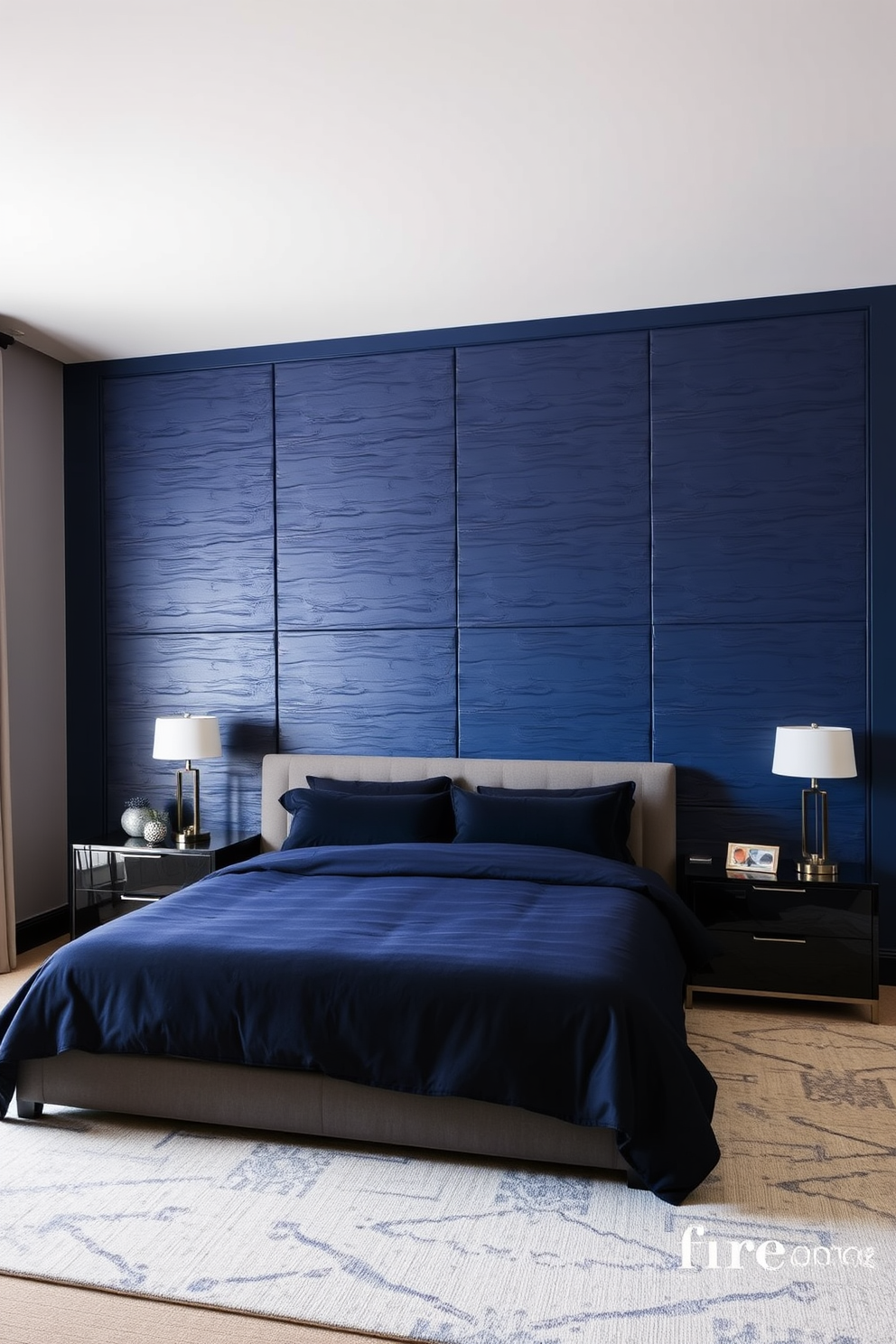 A striking bedroom featuring an accent wall painted in deep navy blue. The wall is adorned with textured panels that create a sense of depth and luxury. The remaining walls are painted in a soft gray to balance the boldness of the accent wall. A plush king-sized bed with dark bedding is positioned against the accent wall, complemented by stylish nightstands on either side.