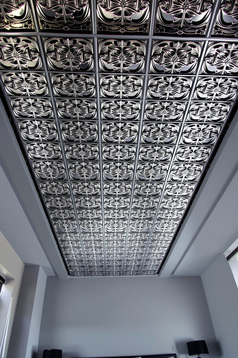 A modern bedroom featuring a striking metal ceiling adorned with intricate tiles that create an industrial aesthetic. The walls are painted in a soft gray, complementing the bold ceiling and enhancing the overall ambiance of the space.