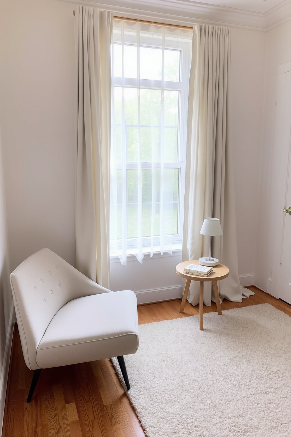 A serene bedroom reading nook with a minimalist design. The space features a sleek, low-profile armchair in a soft neutral fabric positioned next to a large window with sheer curtains allowing natural light to filter in. A small, round side table made of light wood sits beside the chair, holding a stack of books and a modern lamp with a simple design. The walls are painted in a calming white tone, and a plush area rug in a muted color adds warmth to the hardwood floor.