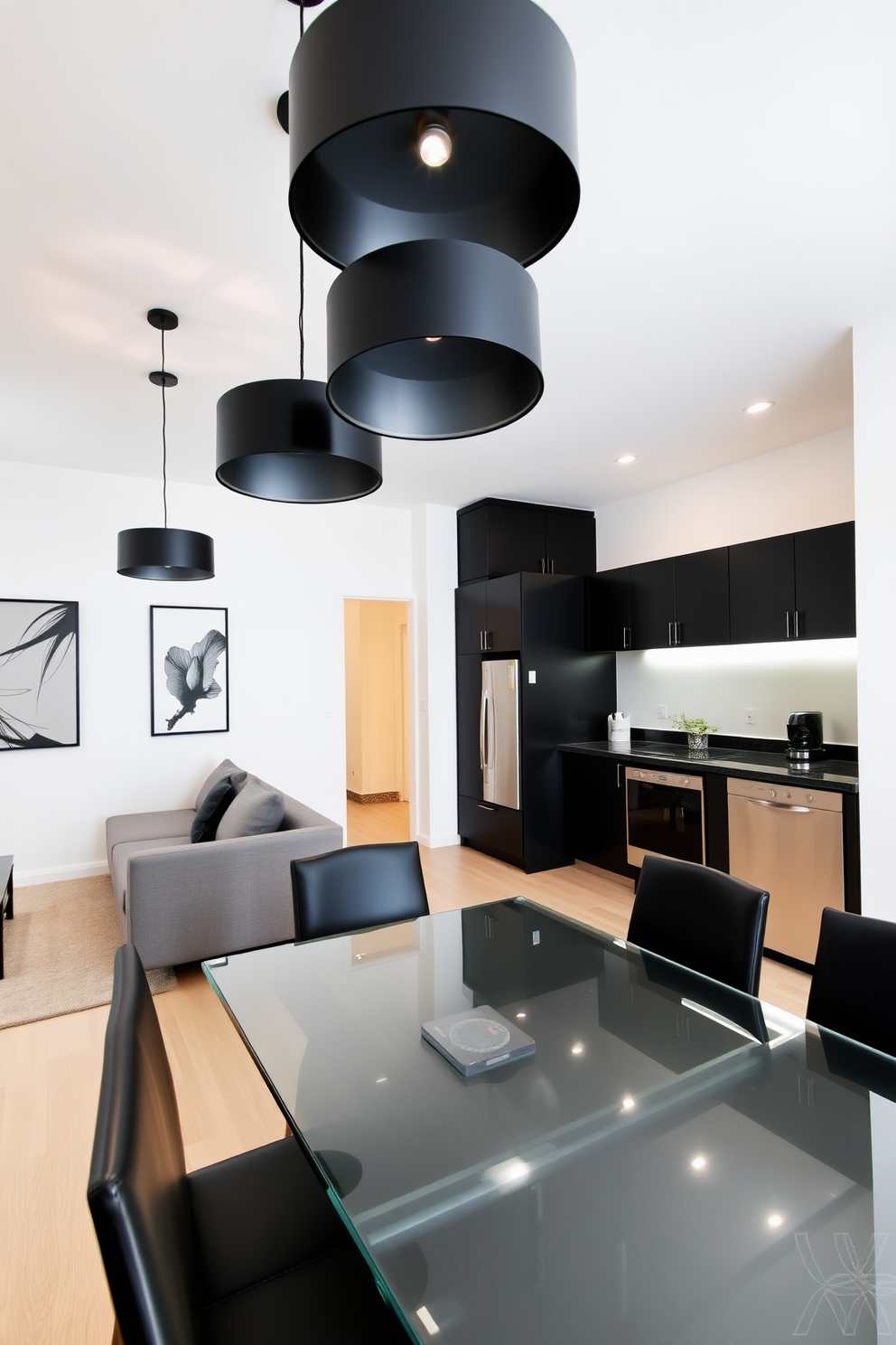 A modern black apartment design featuring sleek black lighting fixtures that create a striking contrast against the light-colored walls. The open living space includes a minimalist sofa, a glass coffee table, and abstract art pieces that add character to the room. The kitchen area showcases black cabinetry paired with stainless steel appliances, enhancing the contemporary aesthetic. A stylish dining table with black chairs completes the look, creating an inviting atmosphere for entertaining guests.