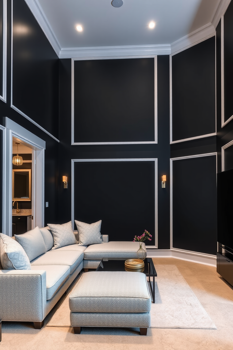 A modern basement design featuring sleek black walls that create a dramatic backdrop. The white trim adds a crisp contrast, enhancing the sophisticated atmosphere of the space. In the center, a plush sectional sofa in a light gray fabric invites relaxation. Accents of gold in the decor, such as a coffee table and light fixtures, bring warmth to the overall design.