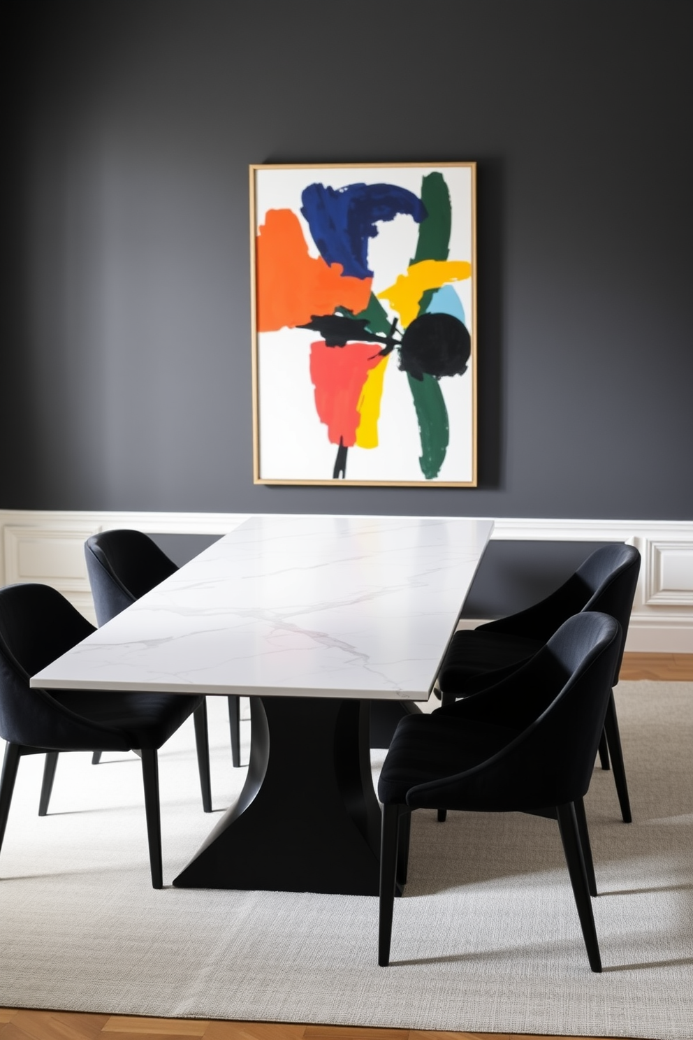 A sleek black dining table with a stunning white marble top takes center stage in a contemporary dining room. Surrounding the table are elegant black chairs upholstered in soft fabric, creating a sophisticated contrast. The walls are painted in a deep charcoal hue, enhancing the modern aesthetic of the space. A large abstract artwork in bold colors hangs above the table, adding a vibrant focal point to the room.