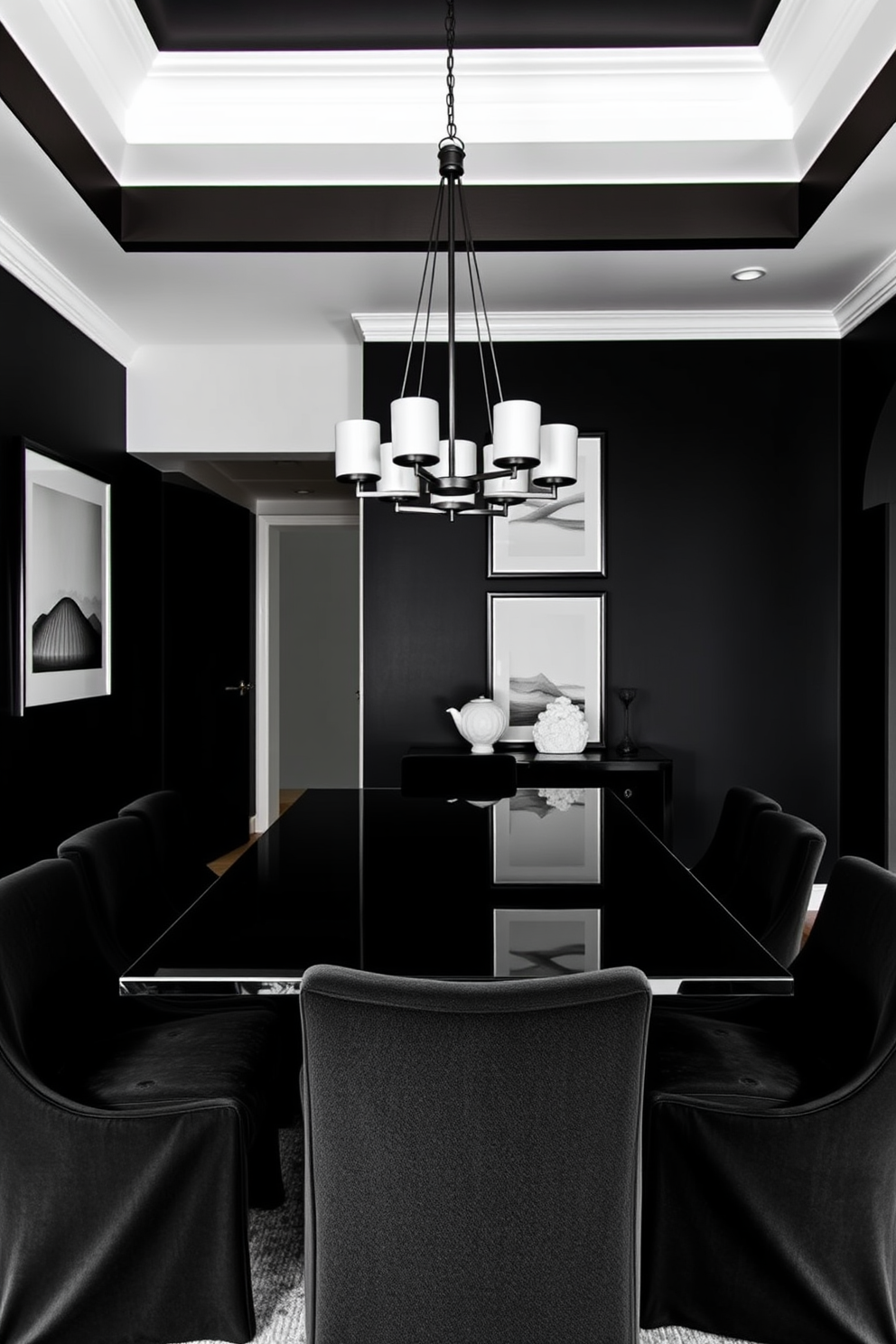 A striking black dining room features walls painted in a deep matte black, creating a dramatic backdrop for the space. Monochromatic art pieces in shades of white and gray are elegantly displayed, drawing attention and adding sophistication to the room. The dining table is a sleek, modern design with a glossy black finish, surrounded by plush upholstered chairs in a complementary black fabric. Soft ambient lighting from a contemporary chandelier above enhances the intimate atmosphere, making it perfect for gatherings.