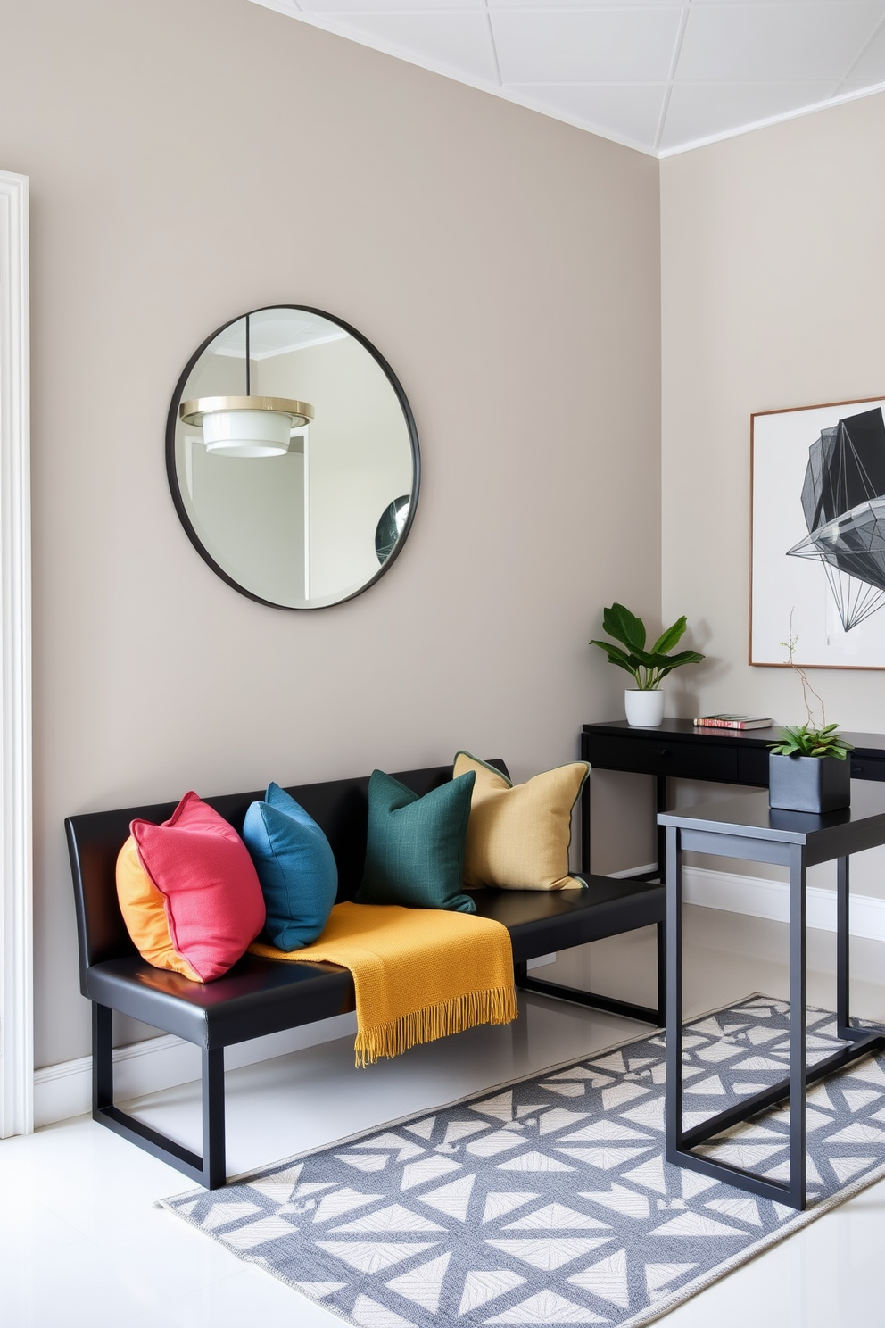 A sleek black bench is positioned against the wall, adorned with an array of colorful pillows that add a vibrant touch. The floor is covered with a geometric patterned rug, and a large circular mirror hangs above the bench, reflecting the light from a stylish pendant lamp. The foyer features a minimalist design with clean lines and a neutral color palette, creating an inviting atmosphere. A statement piece of art is displayed on the wall, while a small potted plant sits on a modern console table, enhancing the overall aesthetic.