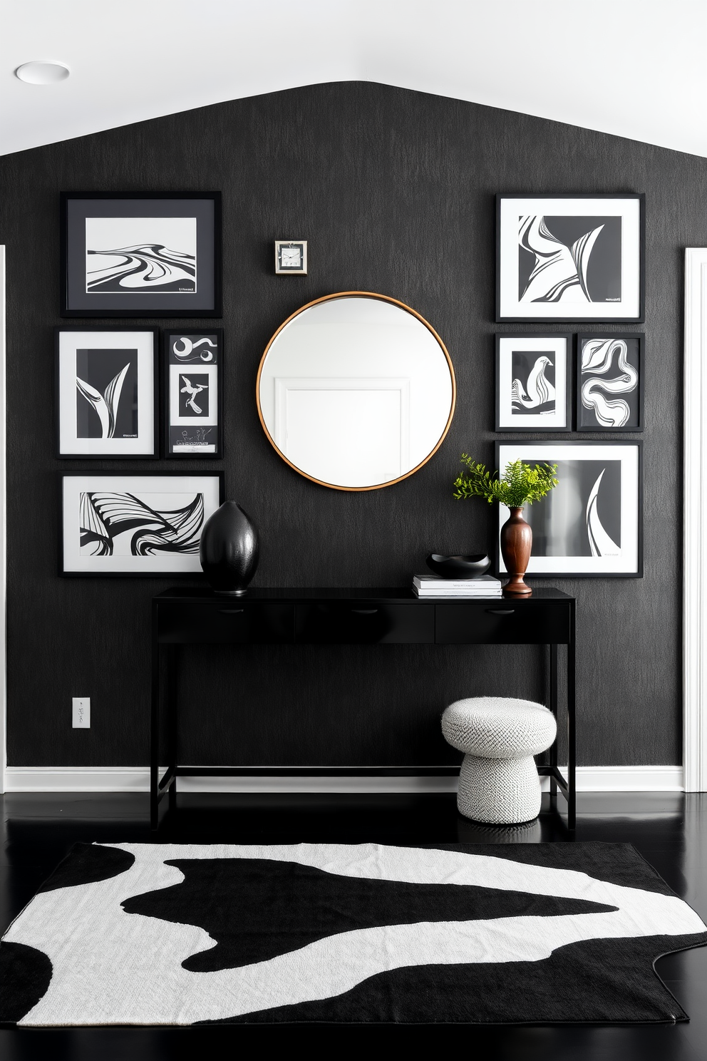 Artistic black wall art gallery display. A collection of striking black and white framed artworks is arranged in a grid pattern on a textured charcoal wall. Black foyer design ideas. The foyer features a sleek black console table adorned with a large round mirror above it, complemented by a stylish black and white area rug.